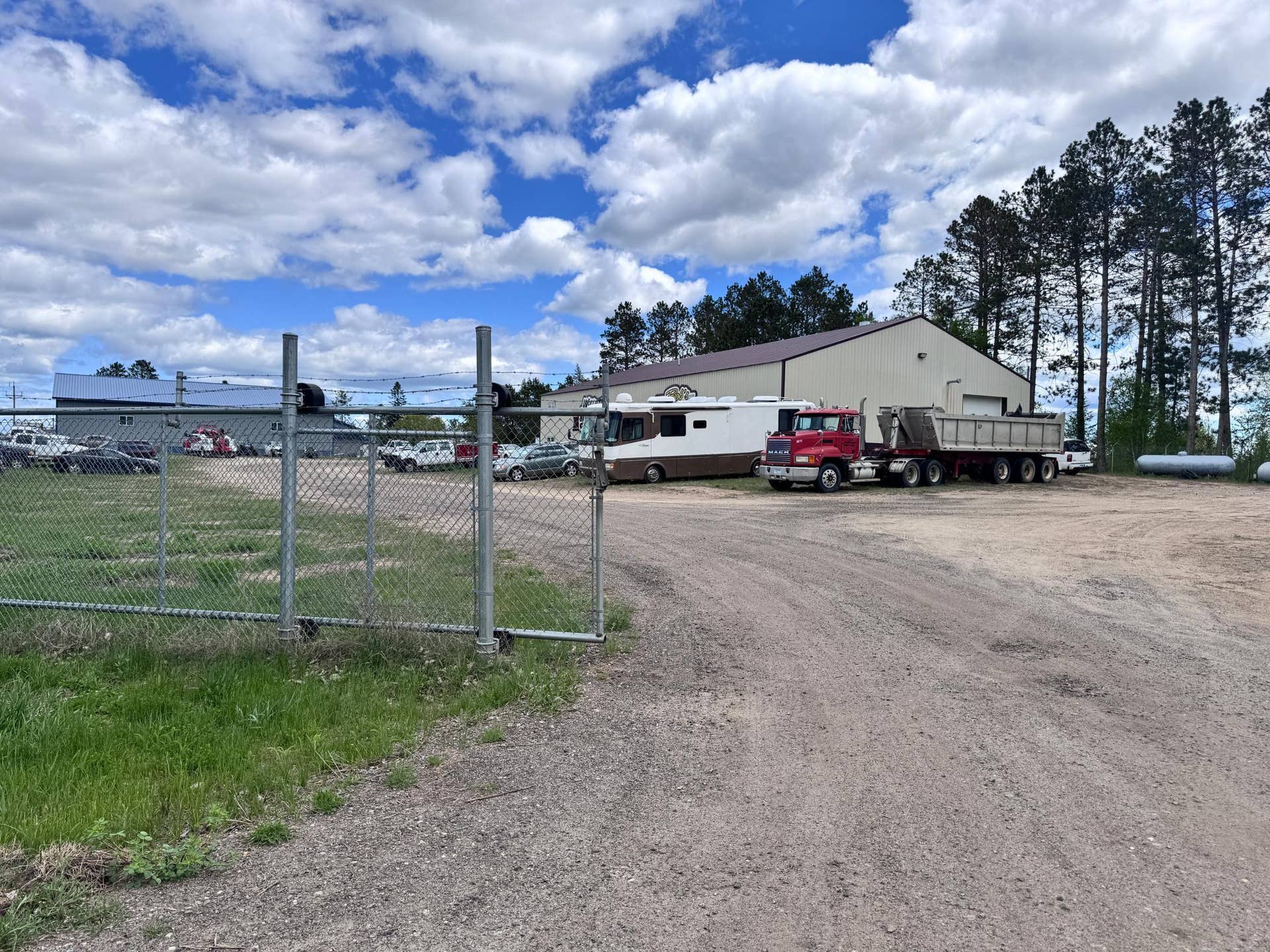 29347 US 2, Bemidji, MN 56601 Wittner Auto Body in a secured gated yard