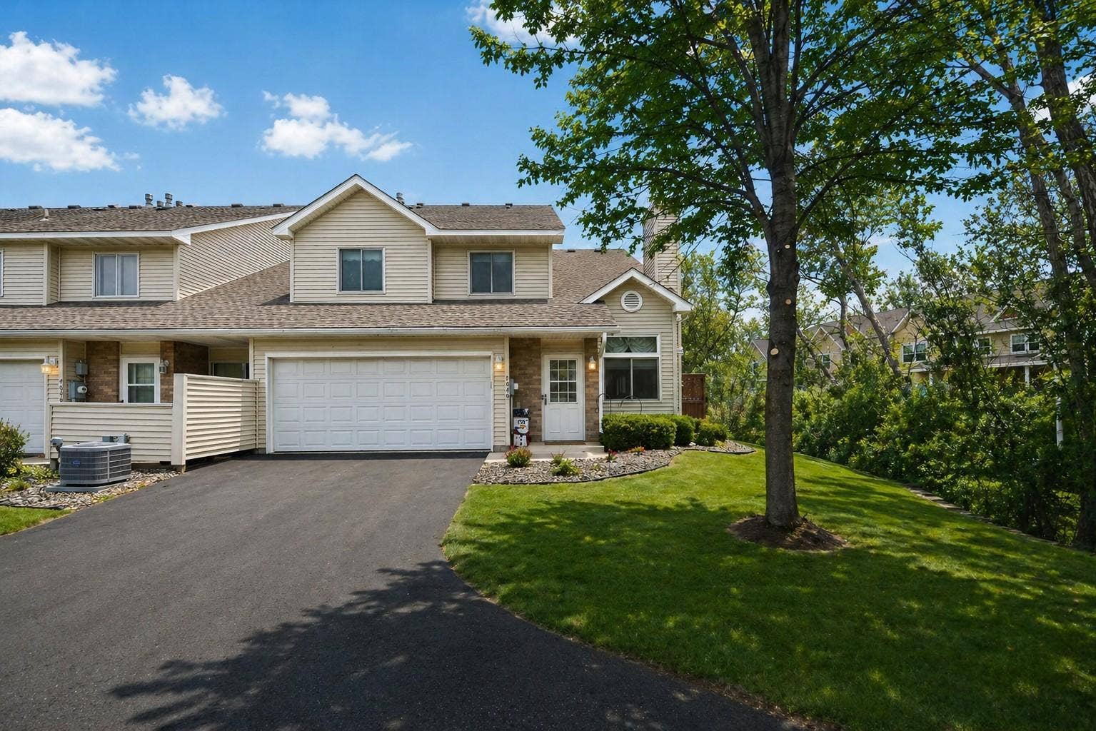 7040 49th Street N, Oakdale, MN 55128 7040 49th Summer Wider Front.jpg