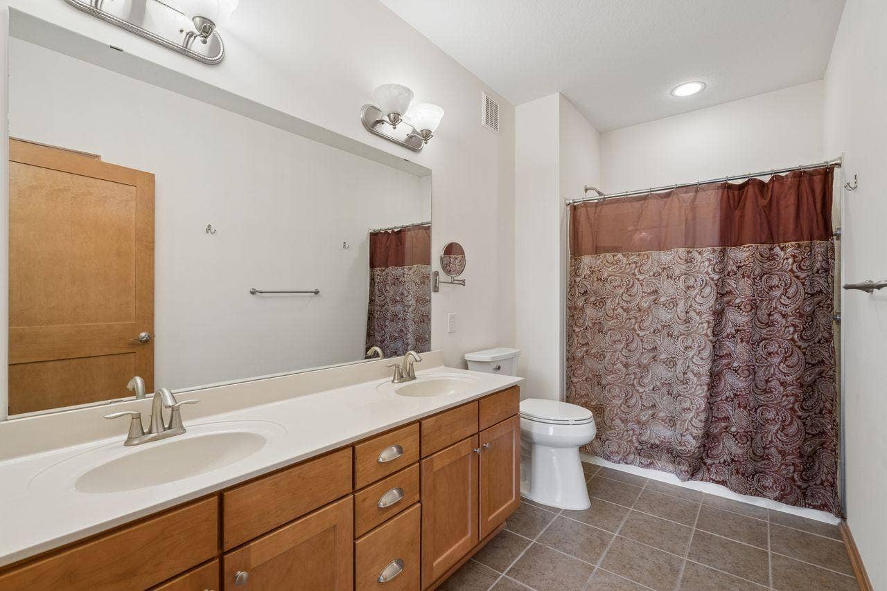 1244 County Road D E, #205, Maplewood, MN 55109 Primary bath, double sinks, shower