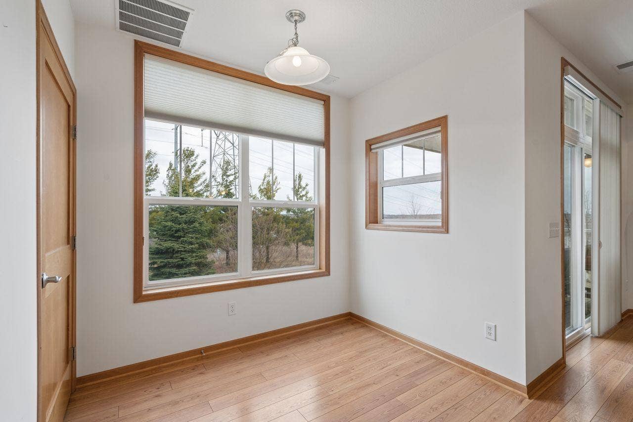 1244 County Road D E, #205, Maplewood, MN 55109 Eat-in kitchen + breakfast bar + dining room to spread out and entertain!