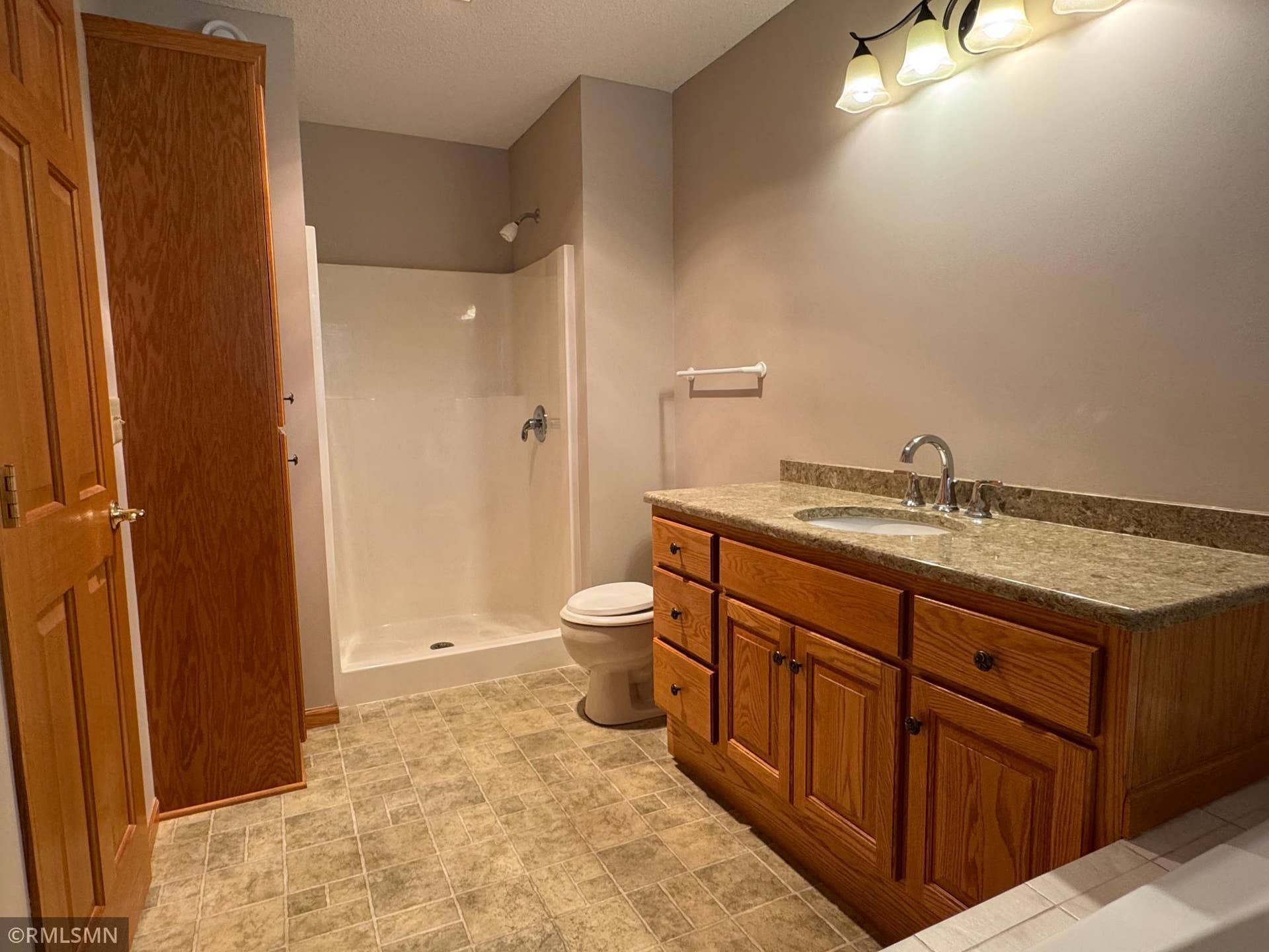 12757 Ferrara Avenue N, Hugo, MN 55038 Owner's bath with seprate shower and whirlpool jetted tub