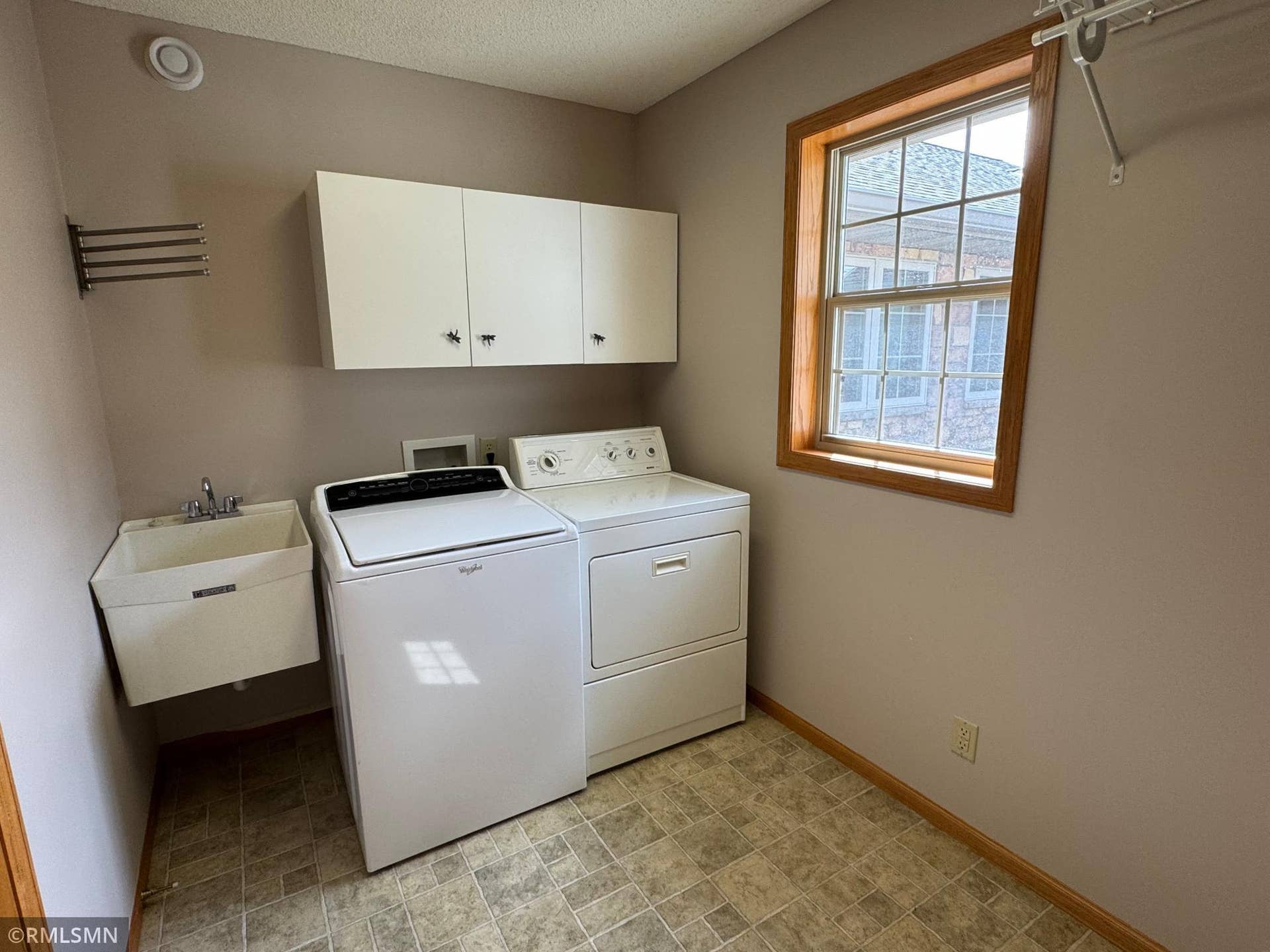 12757 Ferrara Avenue N, Hugo, MN 55038 Main floor laundry between the garage and kitchen