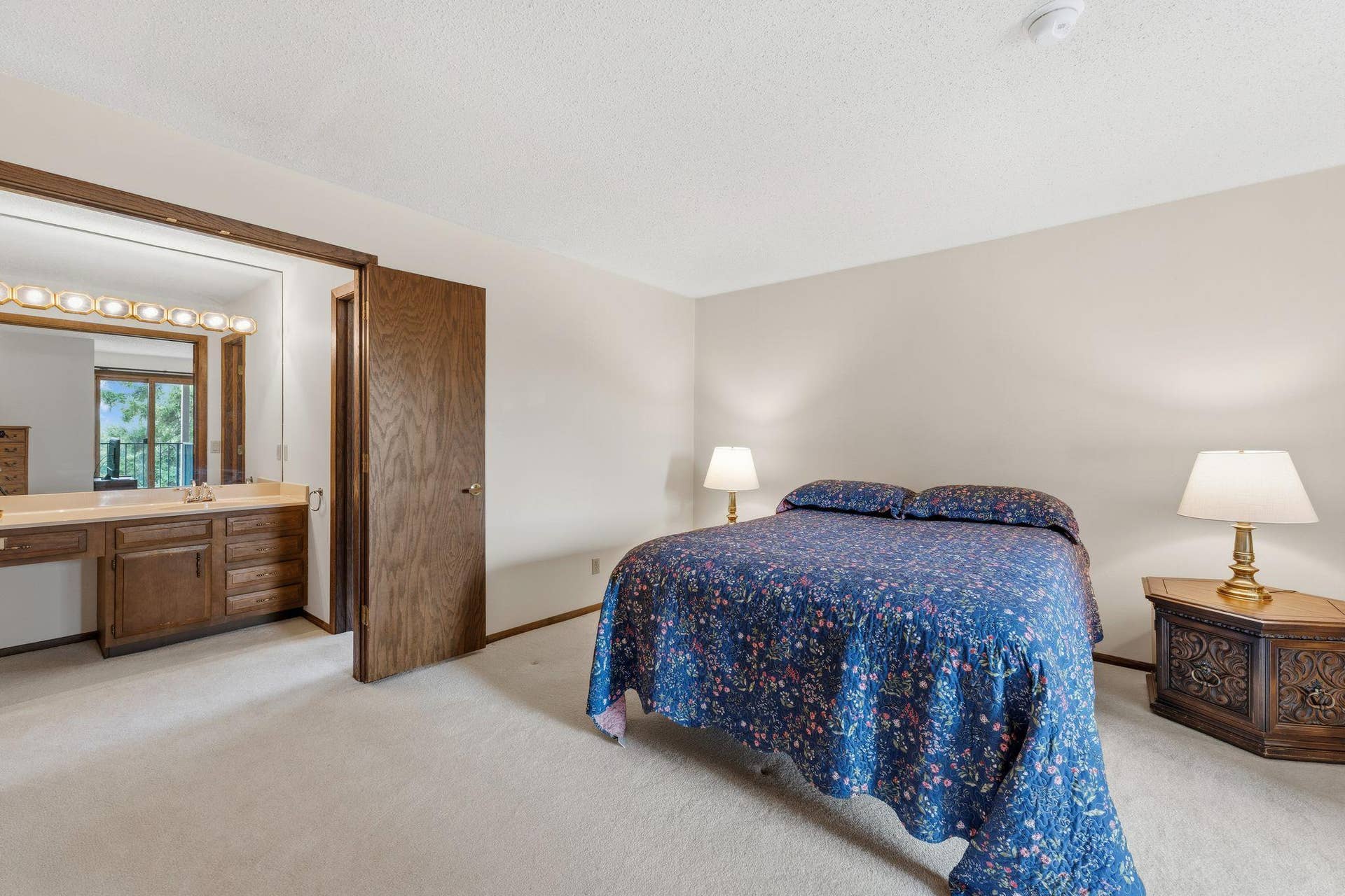 The primary bedroom suite features a 3/4 bathroom and walk-in closet