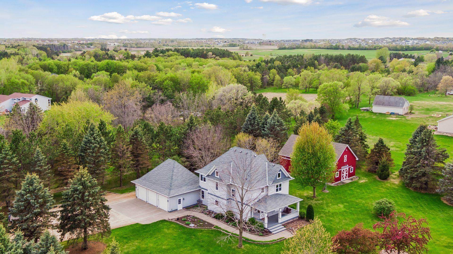 978 Lake Elmo Avenue N, Lake Elmo, MN 55042 Nestled on 2.47 acres, this stunning Lake Elmo two story home combines a comfortable living space within a peaceful, spacious setting.