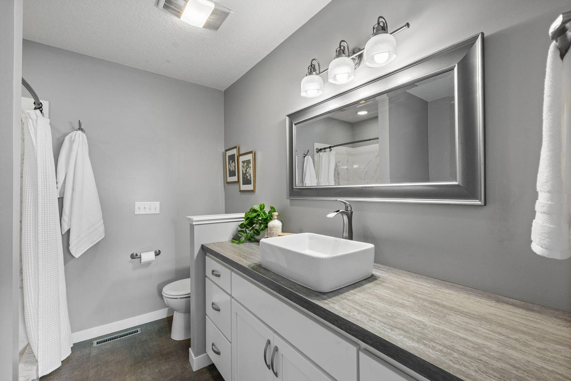 319 Bellwood Avenue, Maplewood, MN 55117 The ensuite bathroom includes a soaking tub, walk-in shower, and vanity.