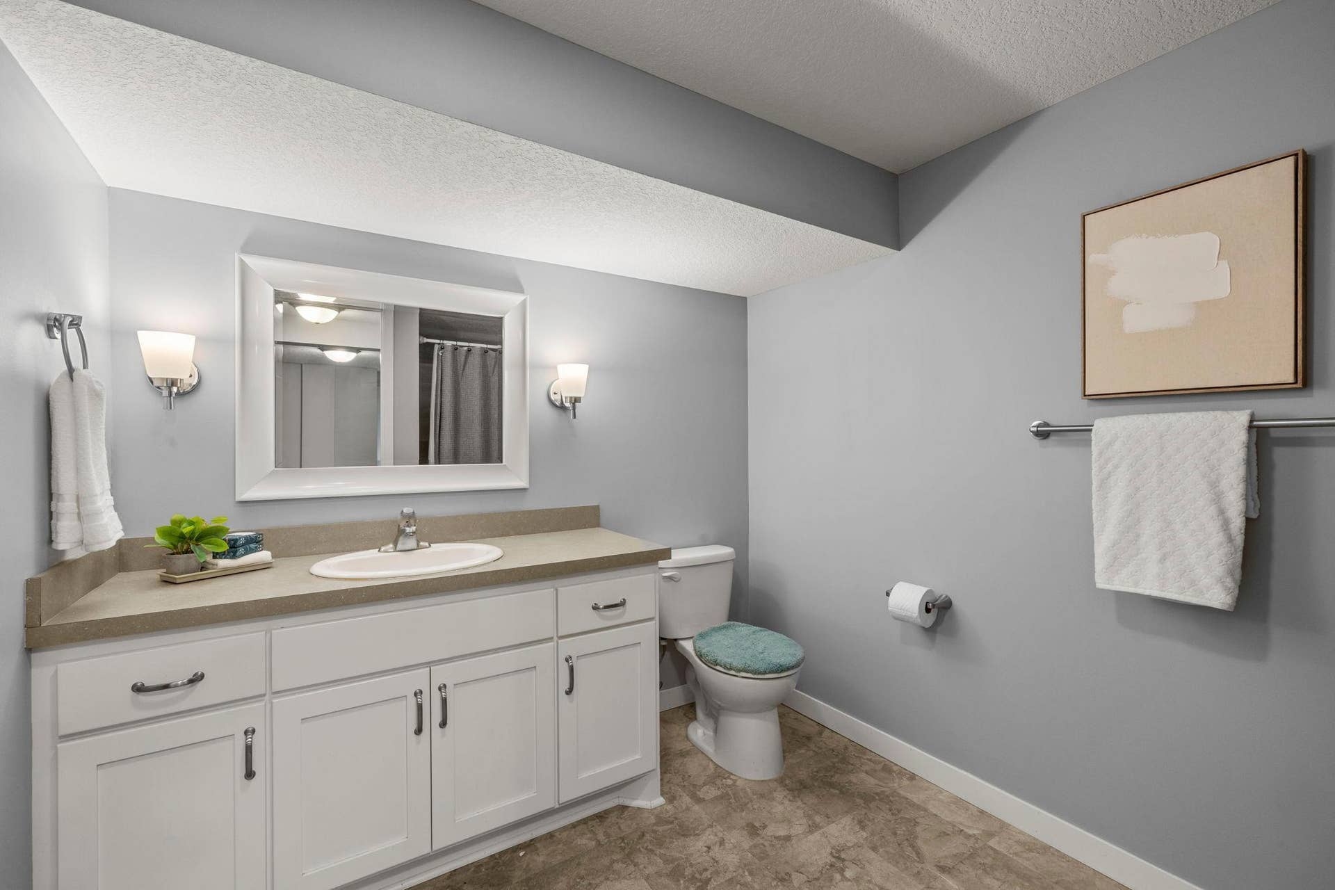 319 Bellwood Avenue, Maplewood, MN 55117 A nearby bathroom offers a walk-in shower and extended vanity space.