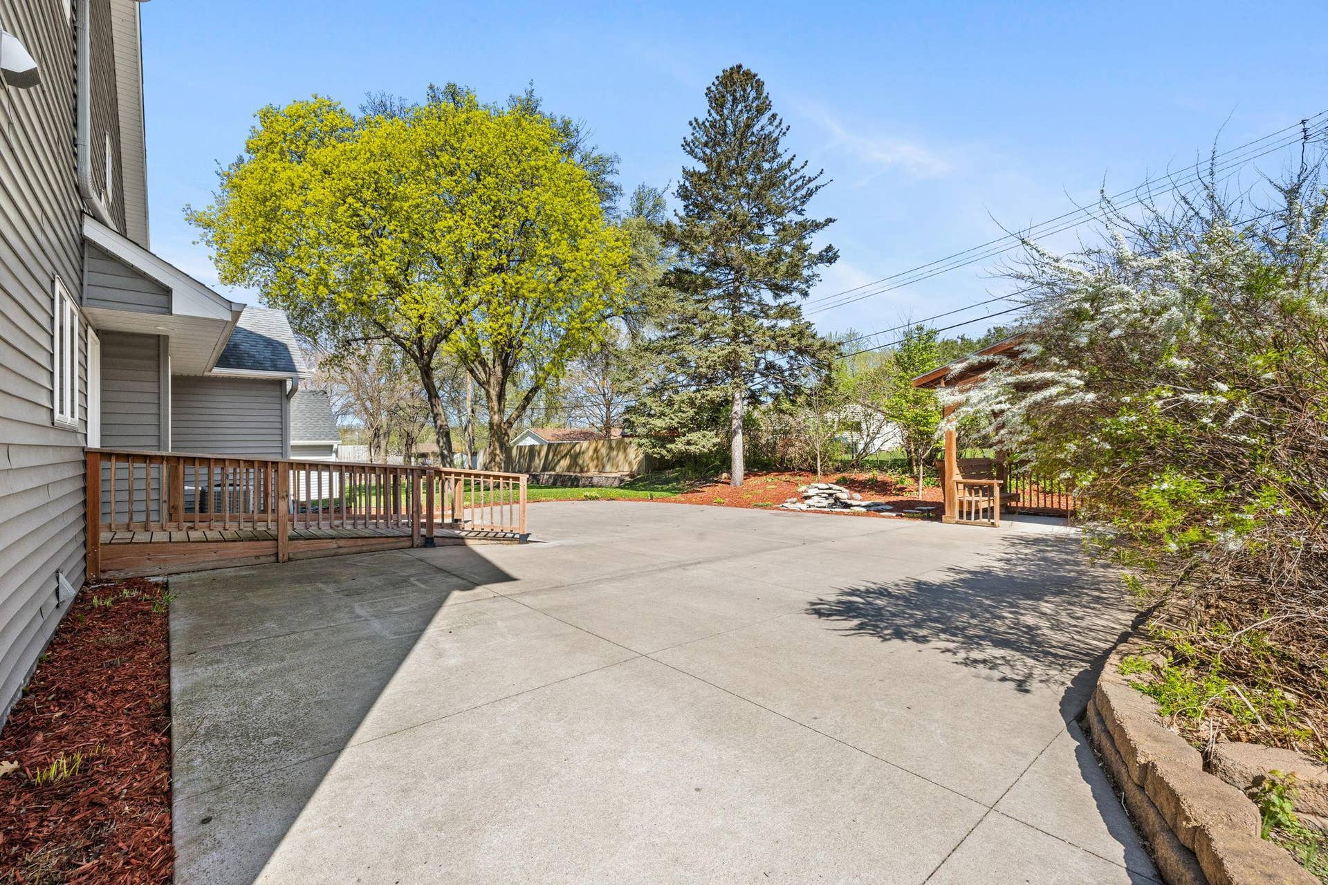 319 Bellwood Avenue, Maplewood, MN 55117 Spacious patio designed for seating, grilling, or gathering around a firepit.