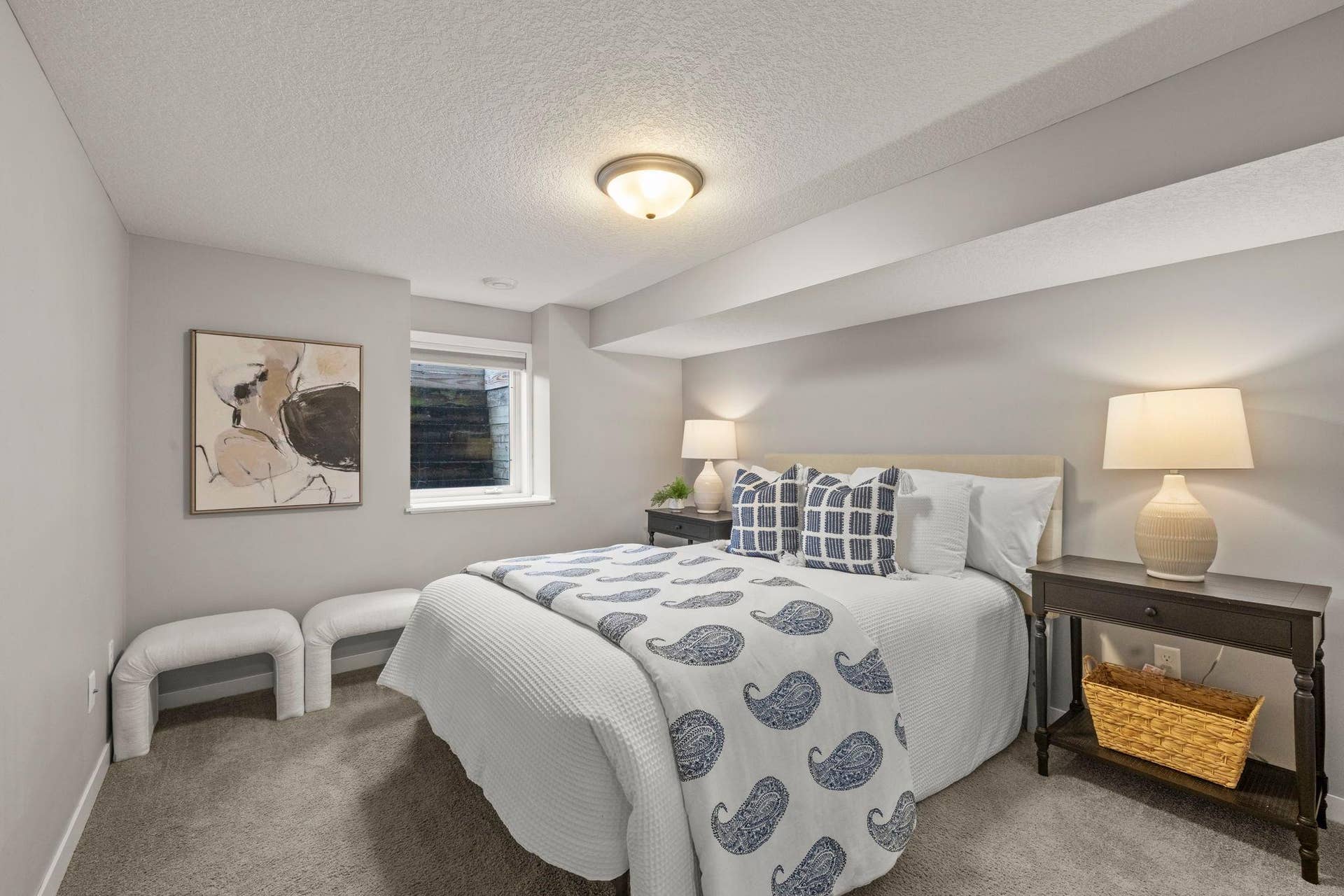 319 Bellwood Avenue, Maplewood, MN 55117 A fifth bedroom includes soft carpeting and a closet with wire shelving for easy organization.