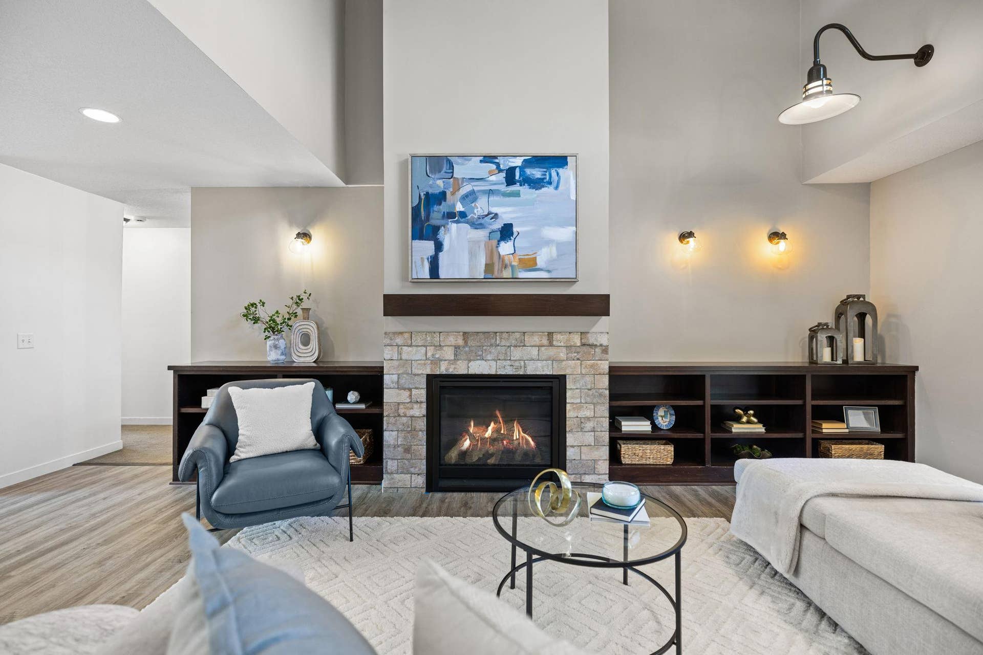 319 Bellwood Avenue, Maplewood, MN 55117 The inviting living room includes built-ins and a gas fireplace for added comfort during colder months.