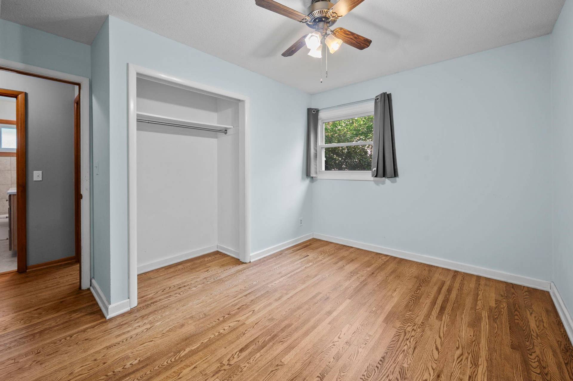 The Primary Bedroom boasts ample closet space and beautiful hardwood floors