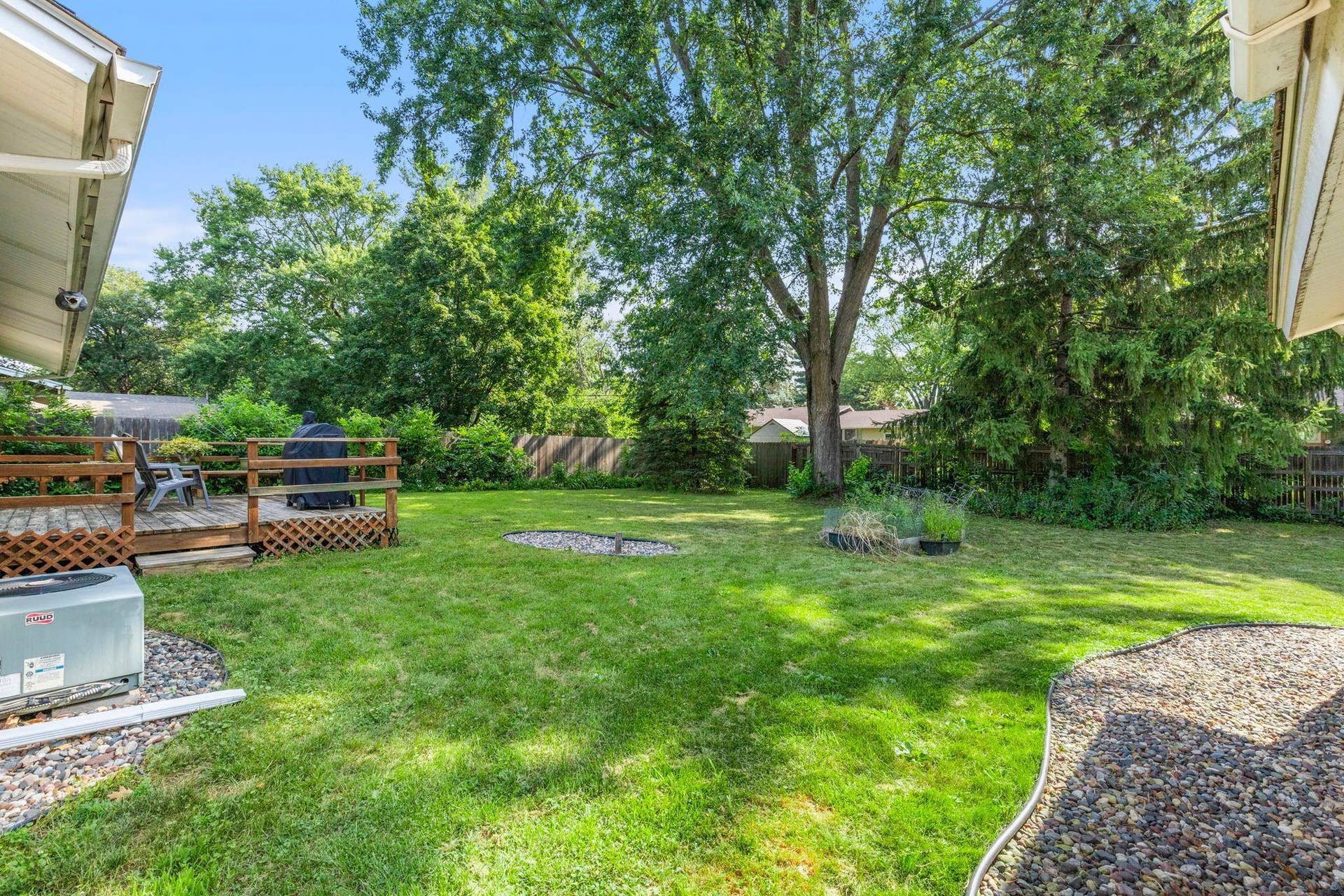 Enjoy views from the Deck of the large back yard and wooded privacy!