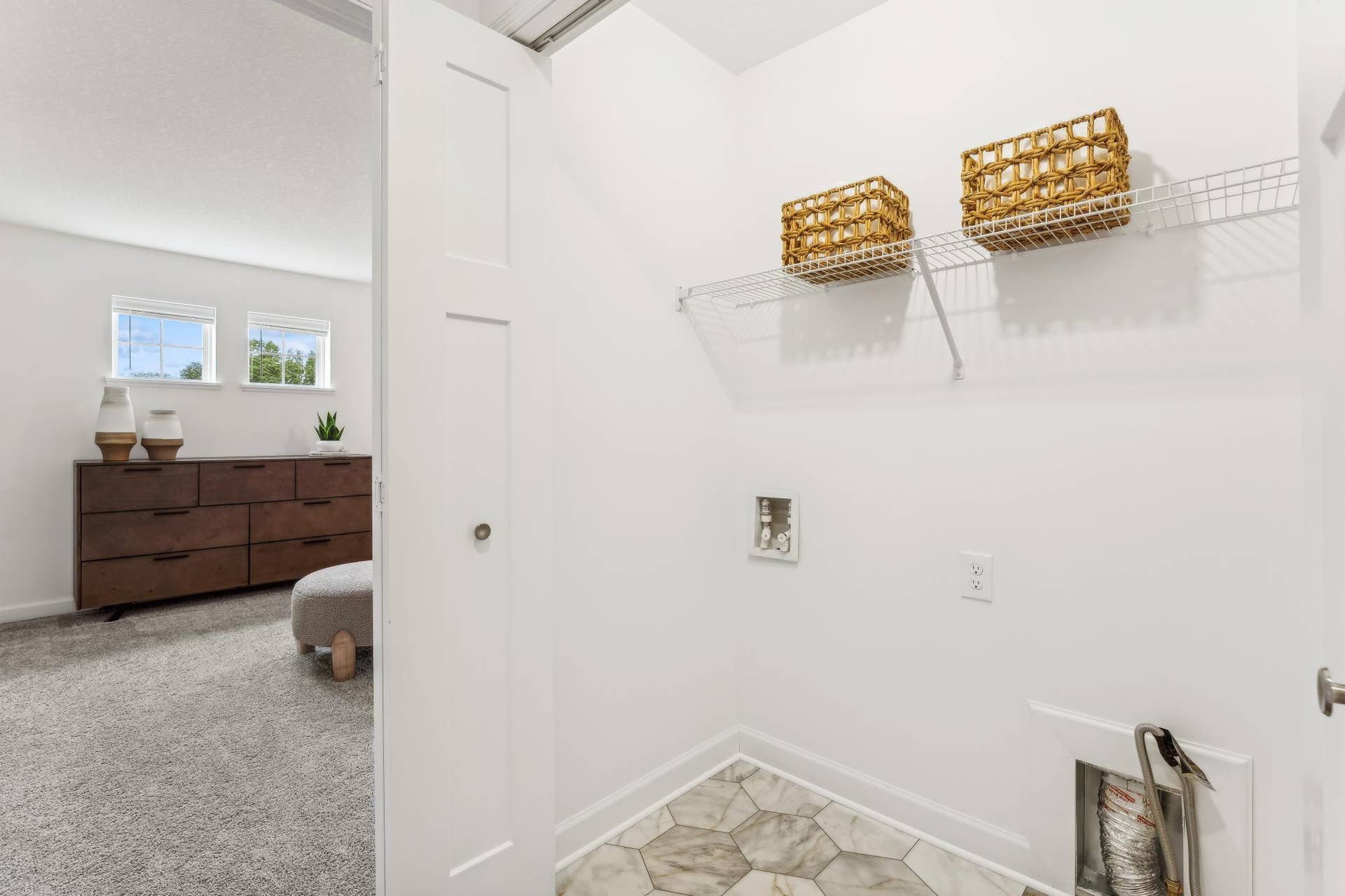 5353 Long Pointe Pass, Woodbury, MN 55129 (Photo of a model home, actual homes finishes will vary) Convenient upper-level laundry