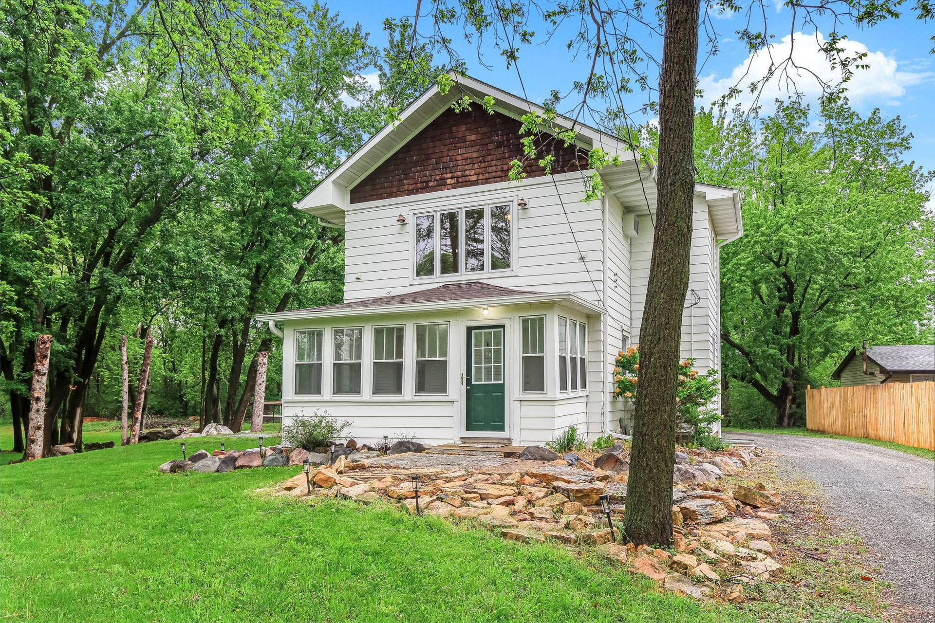 6104 24th Street N, Oakdale, MN 55128 Charming farmhouse on 1.72 acres - all in the heart of the city! The property feels private and serene, with plenty of room for gardens and outdoor living.