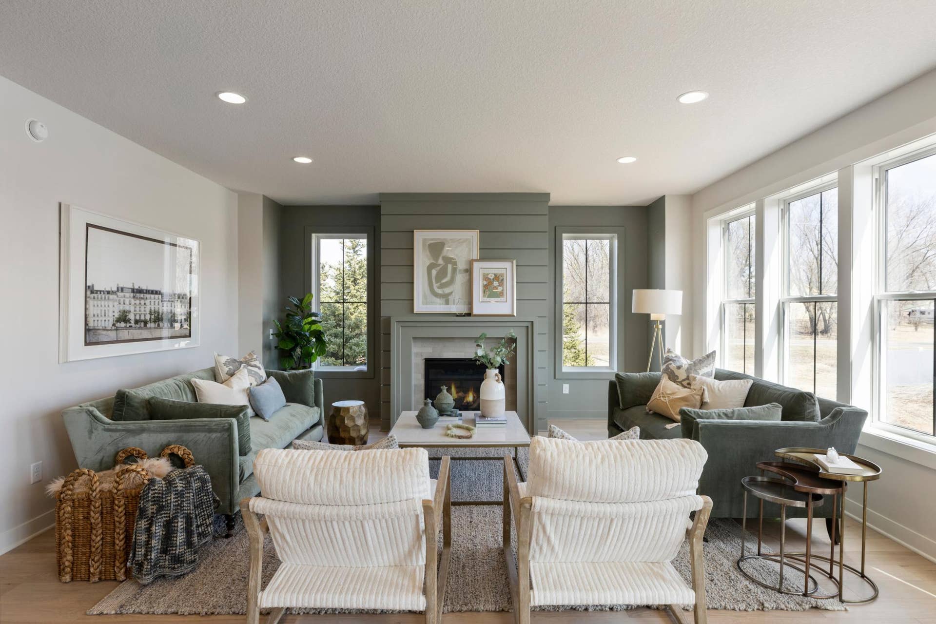 5003 Airlake Drive, Woodbury, MN 55129 Spacious main floor gathering room features color-drenched fireplace wall.