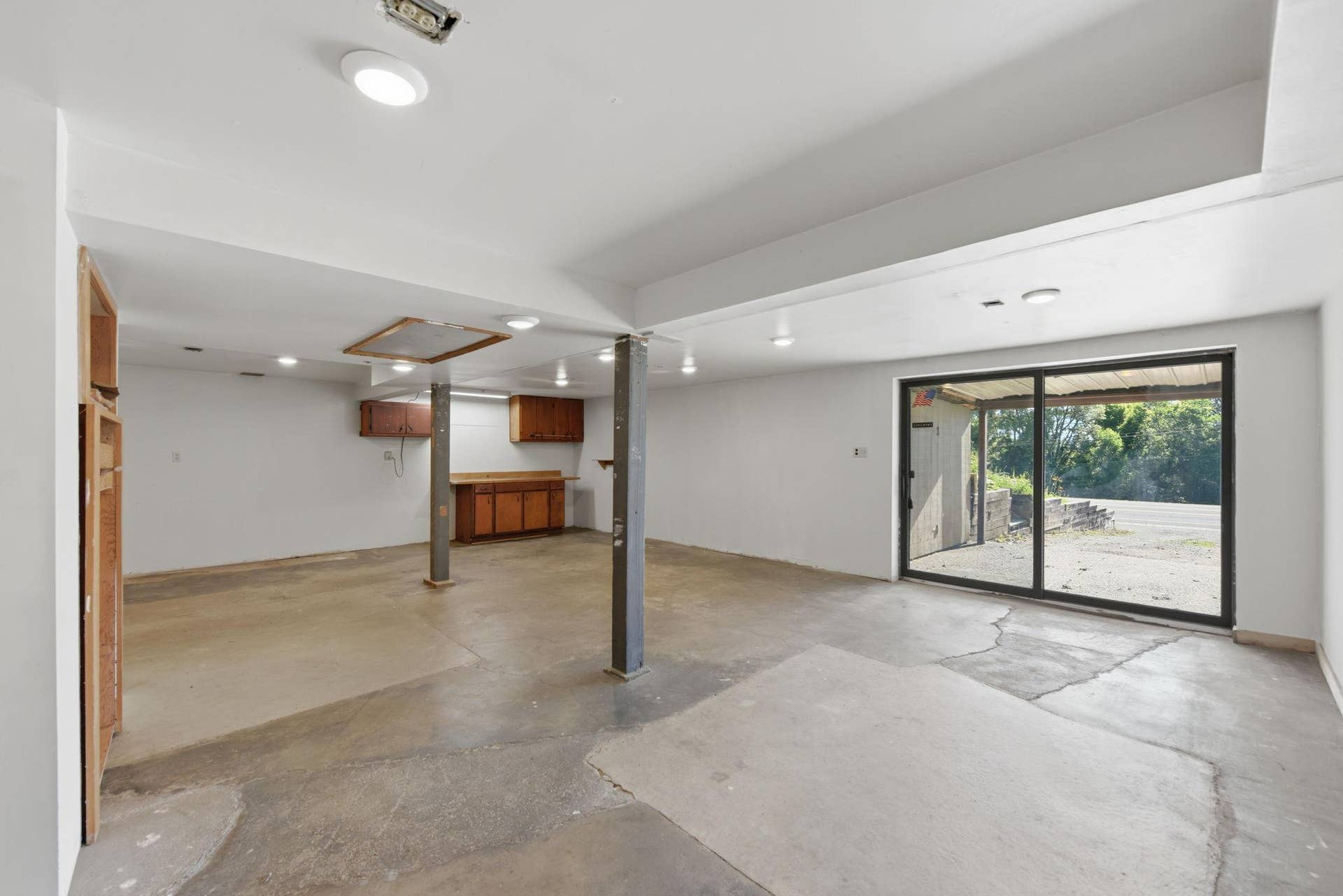 5698 Stagecoach Trail N, Stillwater, MN 55082 Lower Level main room with sliding glass doors to driveway.