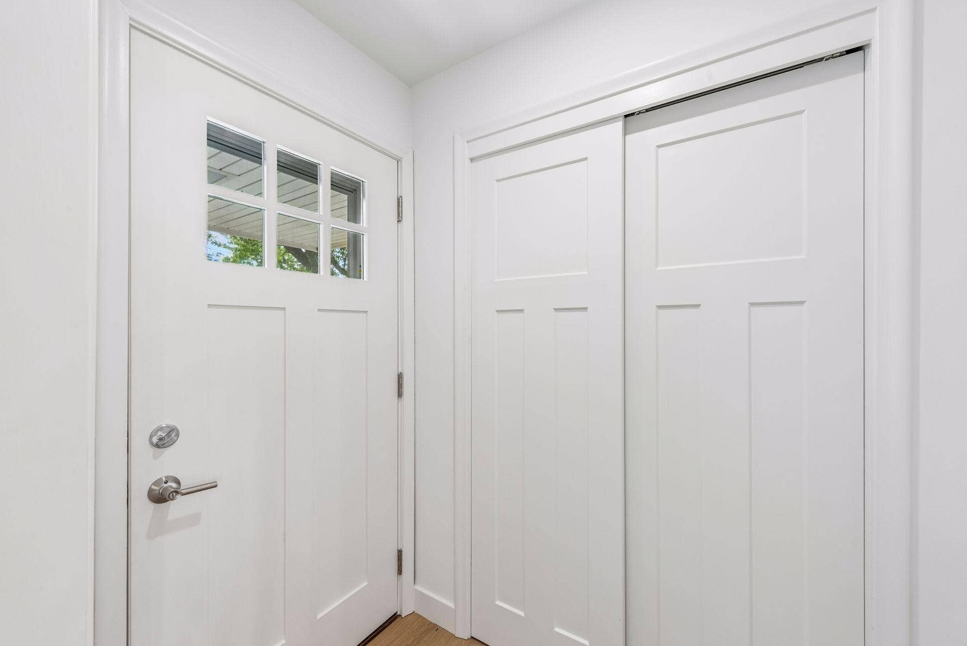 New Craftman-style front door and closet doors.