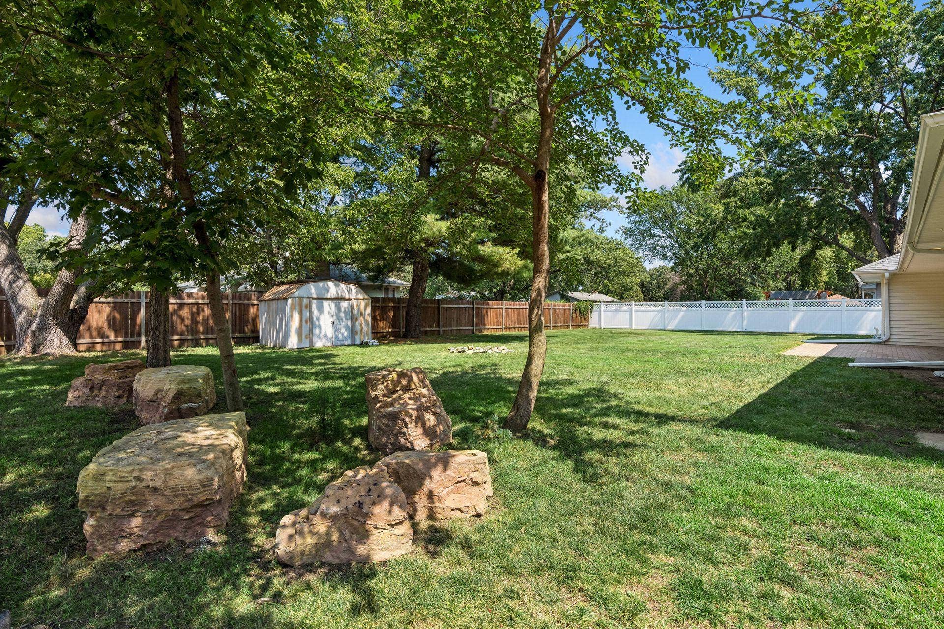 Partially fenced backyard and New Paver patio