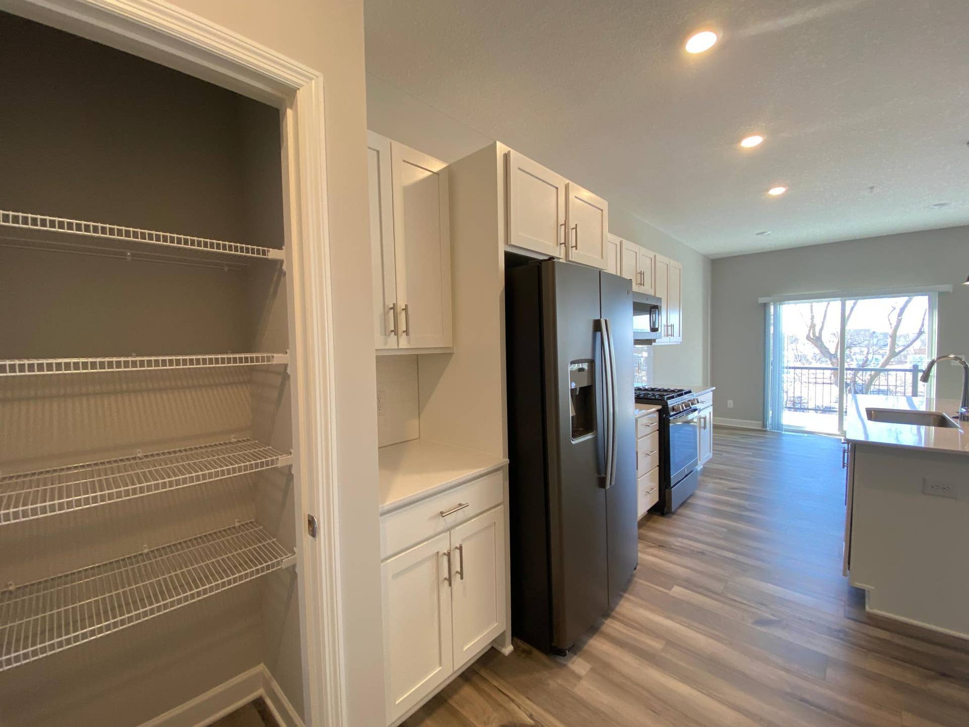 188 Jean Avenue N, Lake Elmo, MN 55042 Perfect Place for a coffee bar right next to the fridge with a pantry that leads into the two-car garage