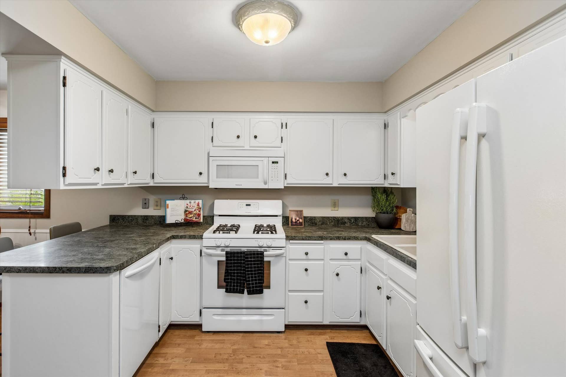 1493 Arundel Street, 97, Saint Paul, MN 55117 Kitchen with newly painted cabinetry