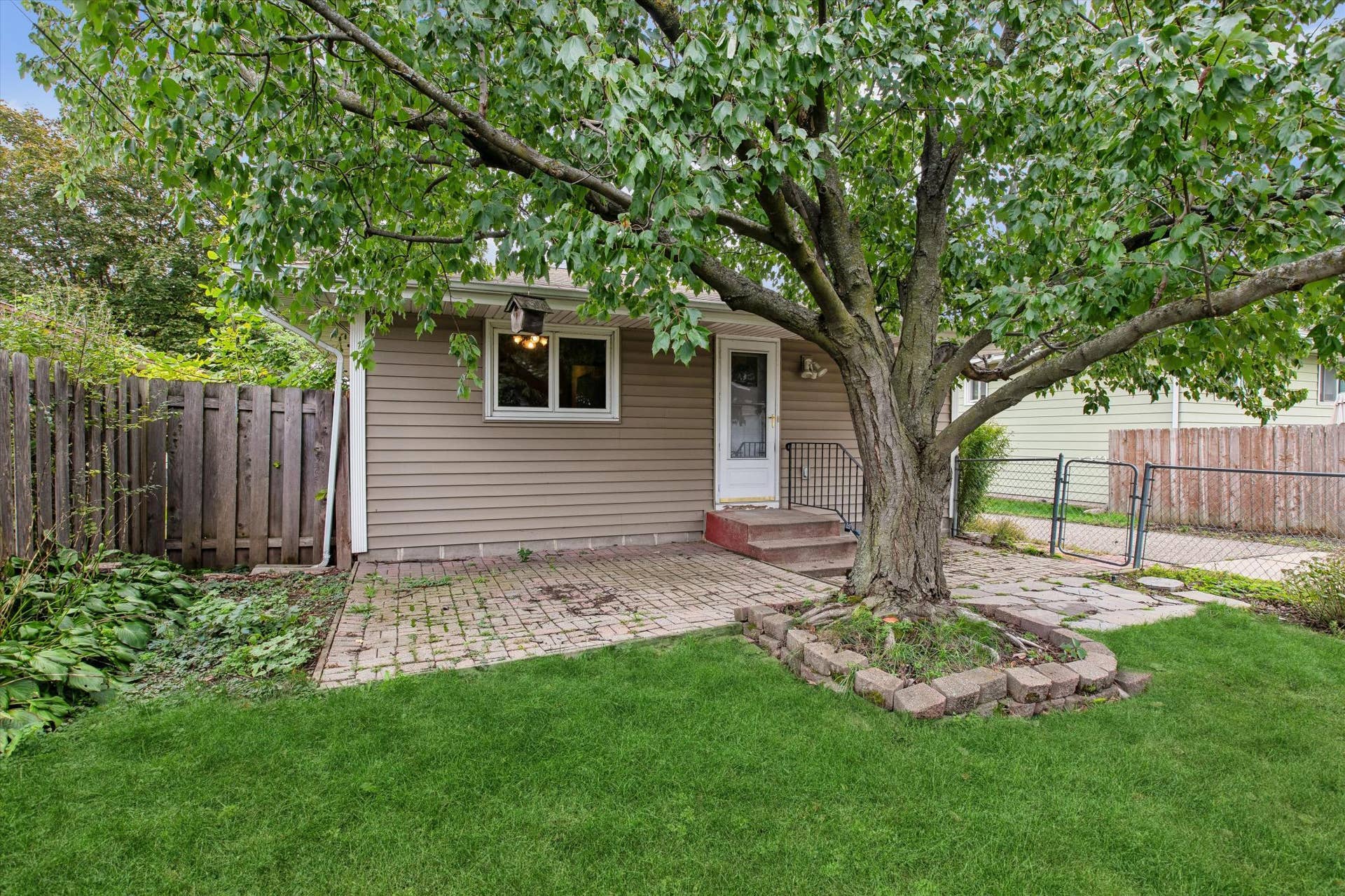 1493 Arundel Street, 97, Saint Paul, MN 55117 Back view of home and patio perfect for bbq's and entertaining