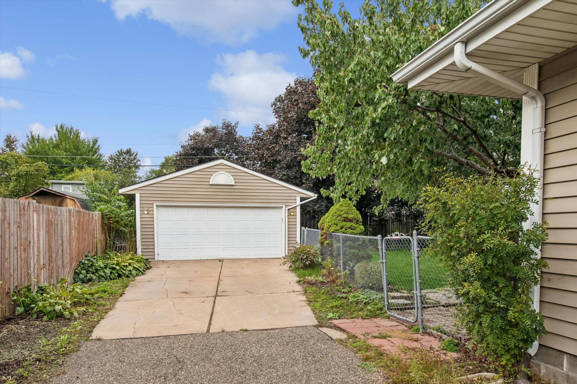 1493 Arundel Street, 97, Saint Paul, MN 55117 2 car garage, long driveway with concrete apron