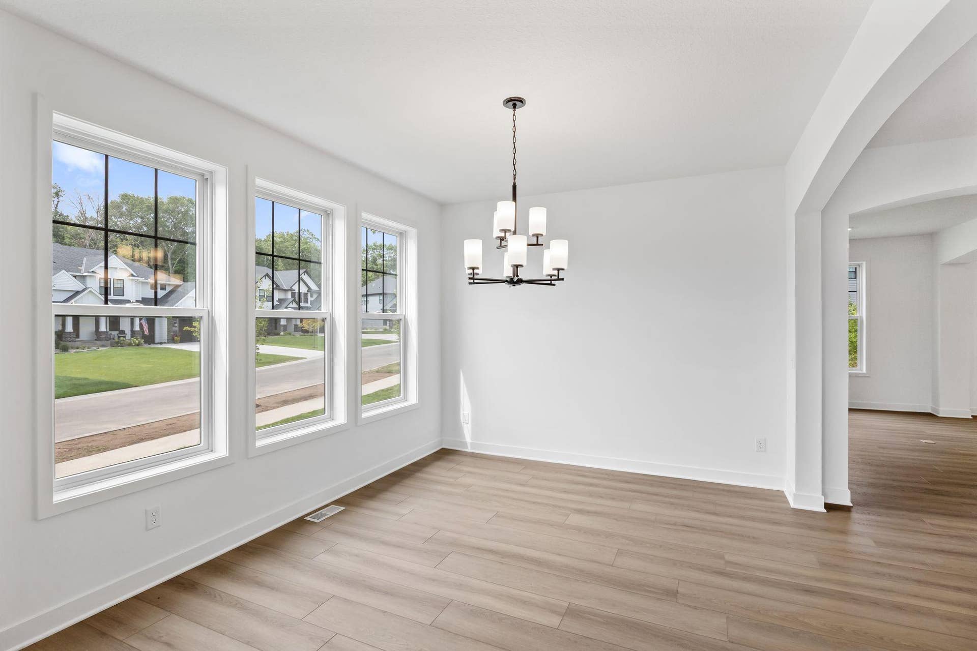 11168 Masters Street N, Lake Elmo, MN 55042 Airy and bright, the formal dining room offers an atmosphere of casual elegance that helps make the simplest meal a memorable occasion.