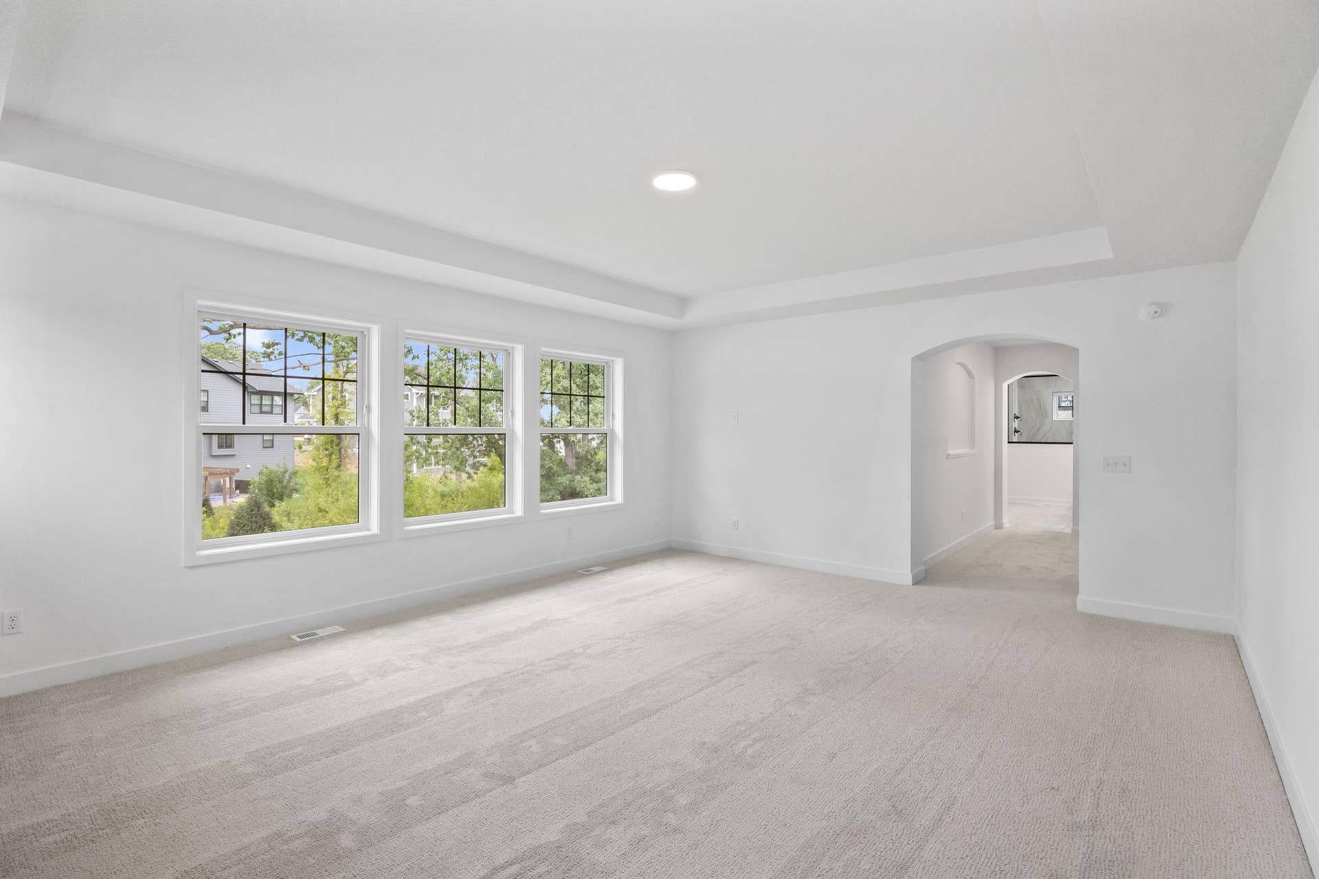11168 Masters Street N, Lake Elmo, MN 55042 French doors open to the tranquil owners suite, which boasts a sprawling bedroom accented by a grand tray ceiling, a luxurious en-suite bathroom and an oversized walk-in closet.