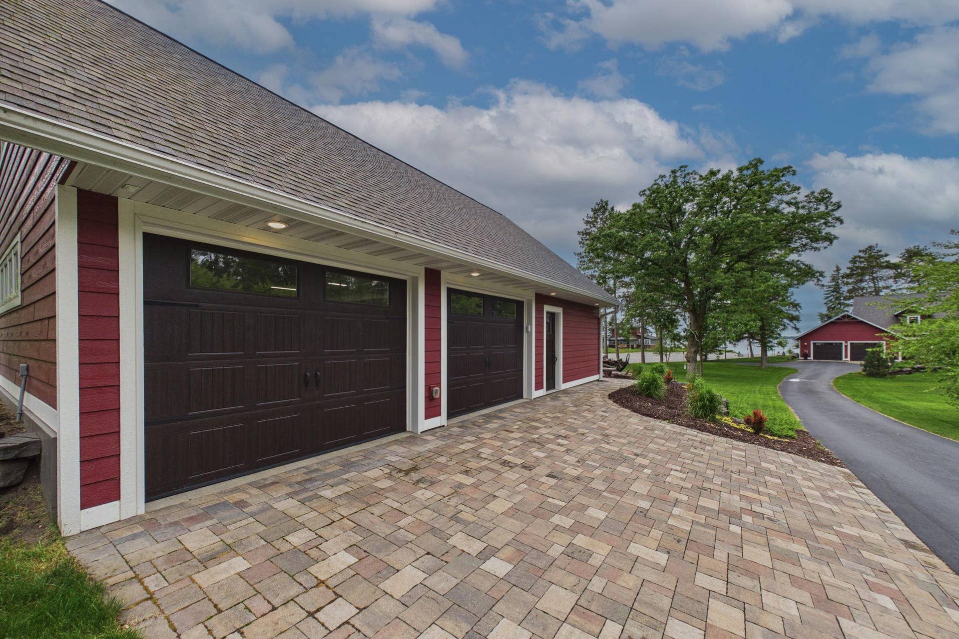 5625 Lavinia Road NE, Bemidji, MN 56601 Pavers line the bonus garage