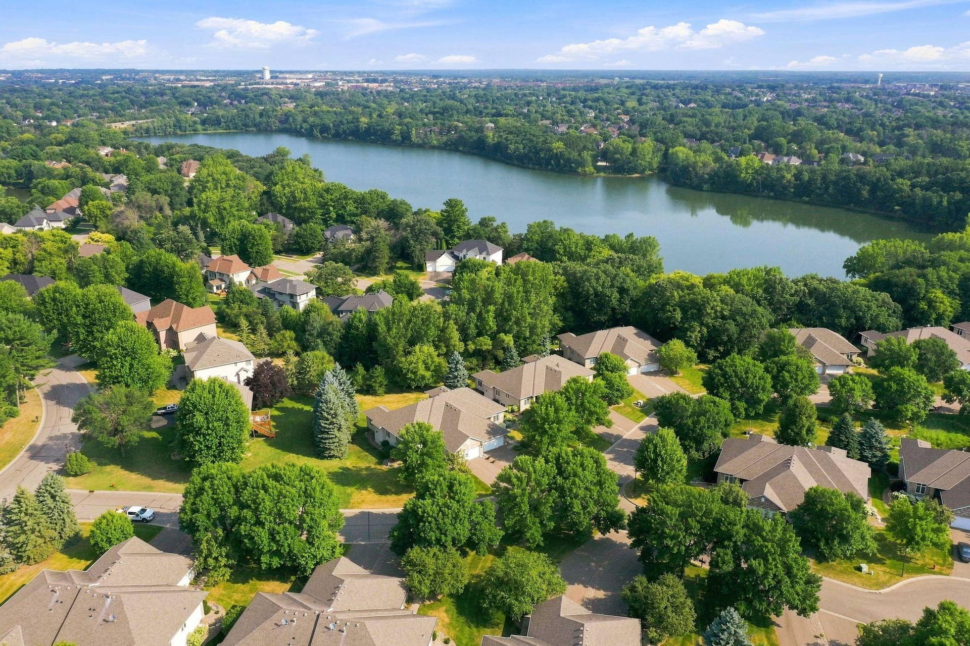 10276 Lancaster Lane, Woodbury, MN 55129 Sought after Powers Lake neighborhood