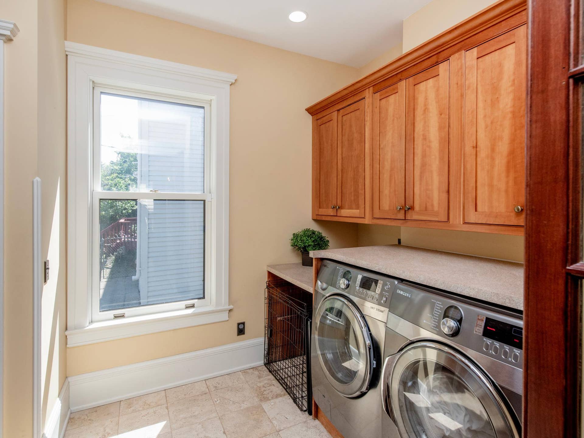 661 Fairmount Avenue, 100, Saint Paul, MN 55105 Laundry area with ample cabinet space and a built-in kennel