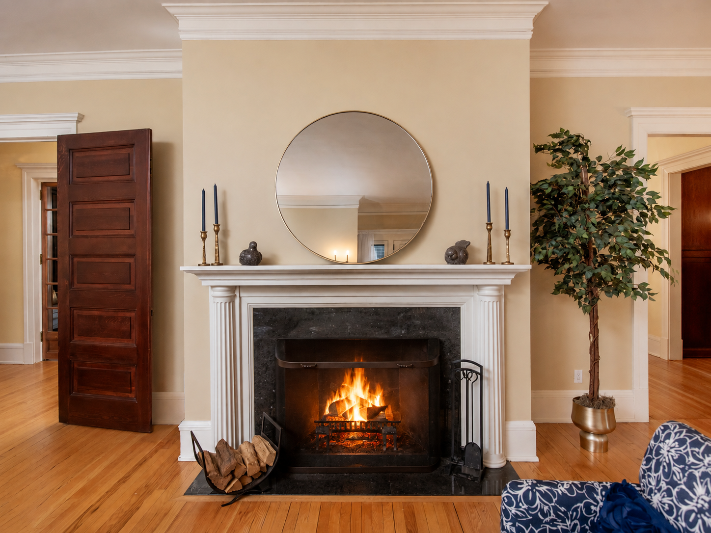 661 Fairmount Avenue, 100, Saint Paul, MN 55105 A gracious parlor designed for elegant entertaining, charitable gatherings, and celebrations, featuring a stately wood-burning fireplace with a beautifully crafted original hearth