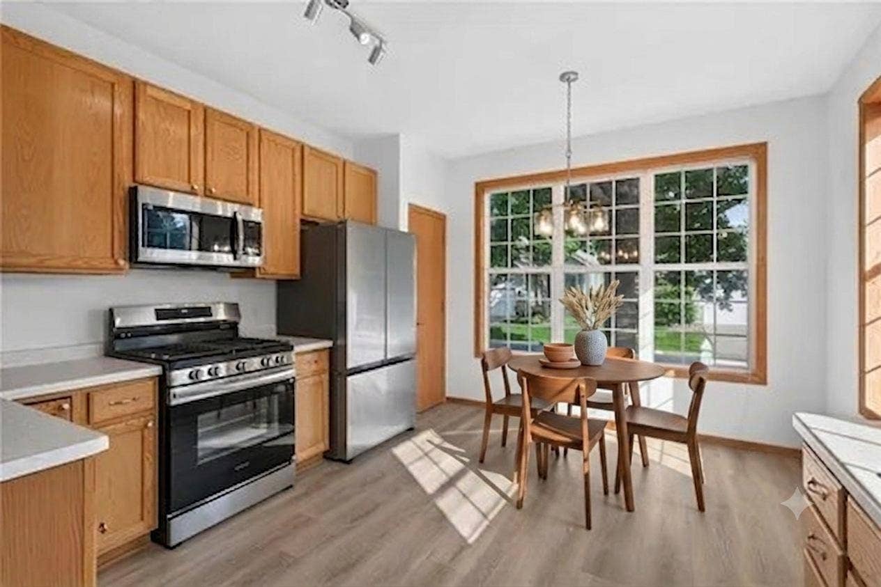 442 Meadowood Lane, Burnsville, MN 55337 AI added table and chairs