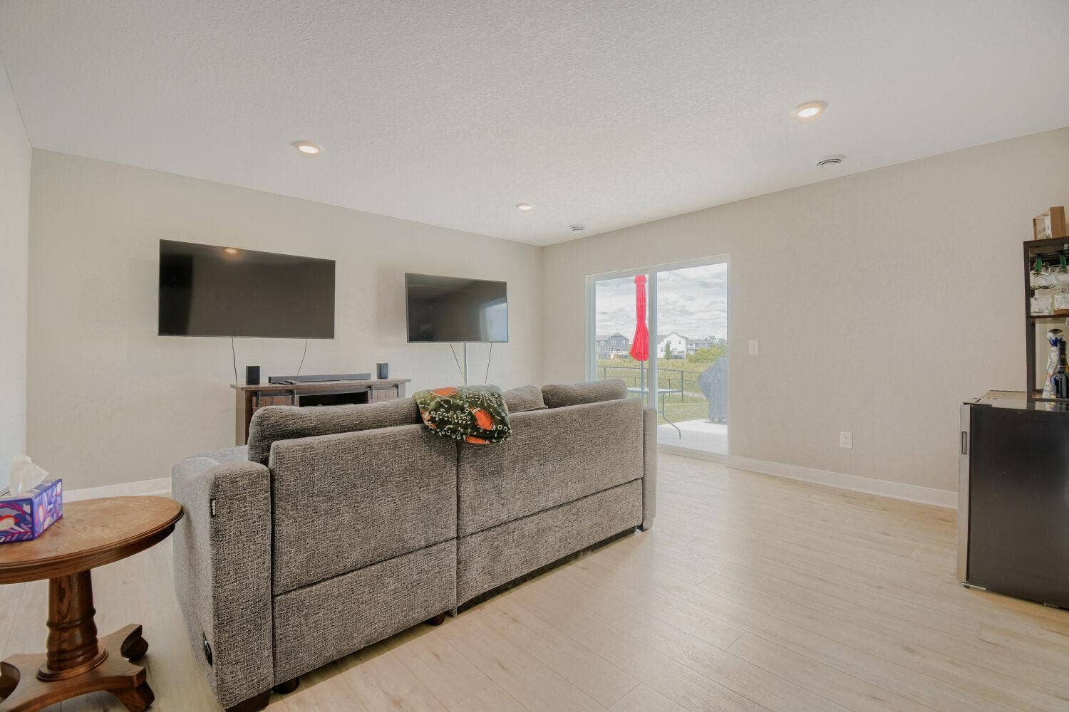 Lower level walkout family room adds gathering and entertainment space.