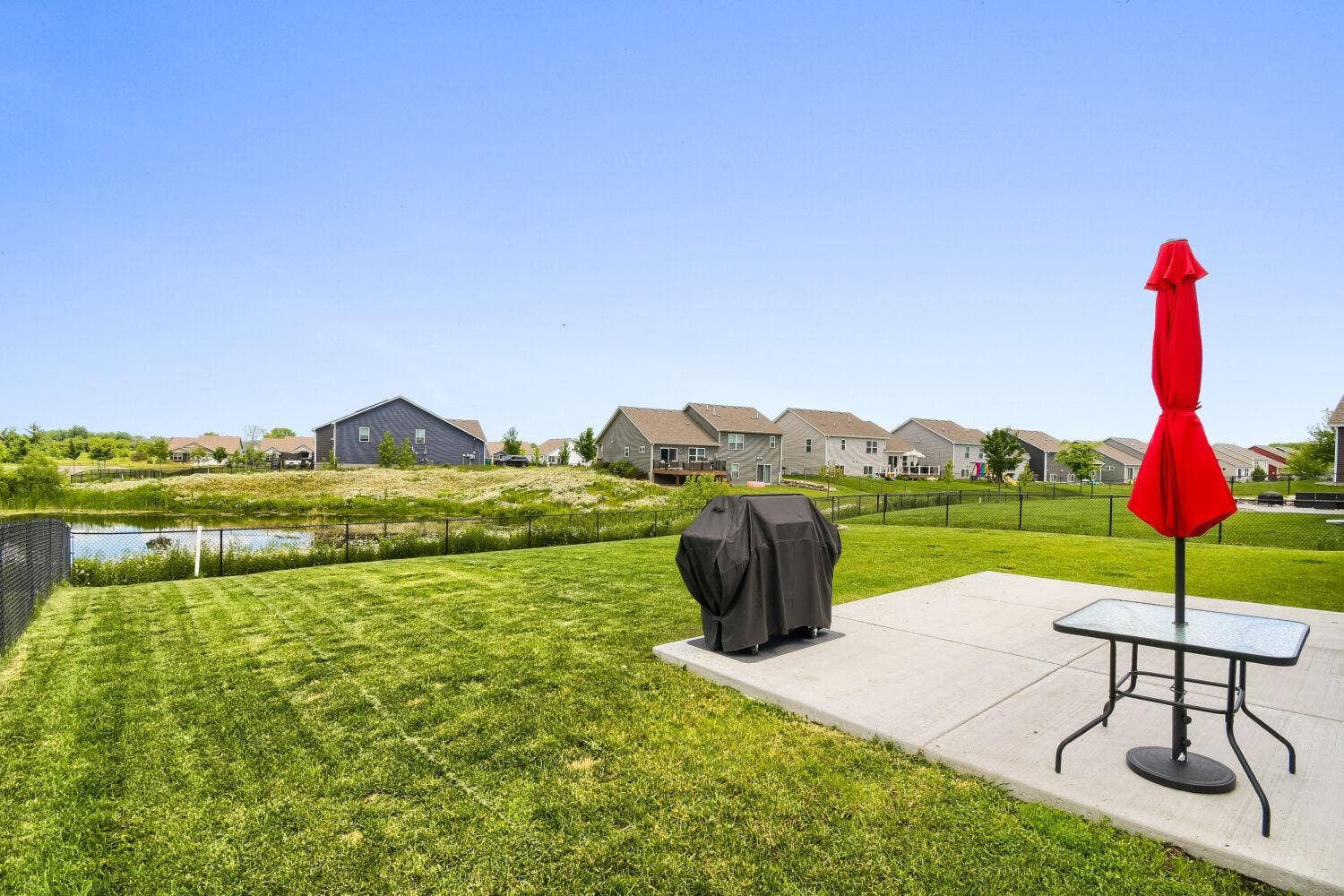 Patio space out back is a great place to grill and enjoy an evening meal.