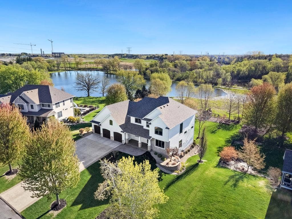5729 Linden Avenue N, Lake Elmo, MN 55042 Tucked into the prestigious Sanctuary neighborhood of Lake Elmo nearly an acre of lush, private grounds and nearly 5,500 SF of custom luxury.