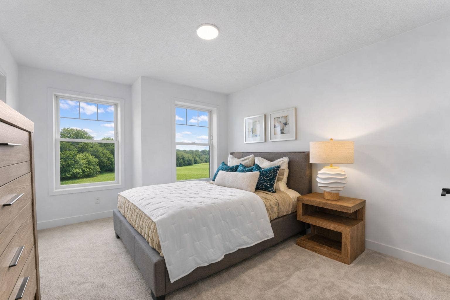 1848 Royal Boulevard N, Lake Elmo, MN 55042 With a walk-in closet and direct access to an attached bathroom with dual sinks, this bedroom is designed to provide enhanced comfort and convenience.