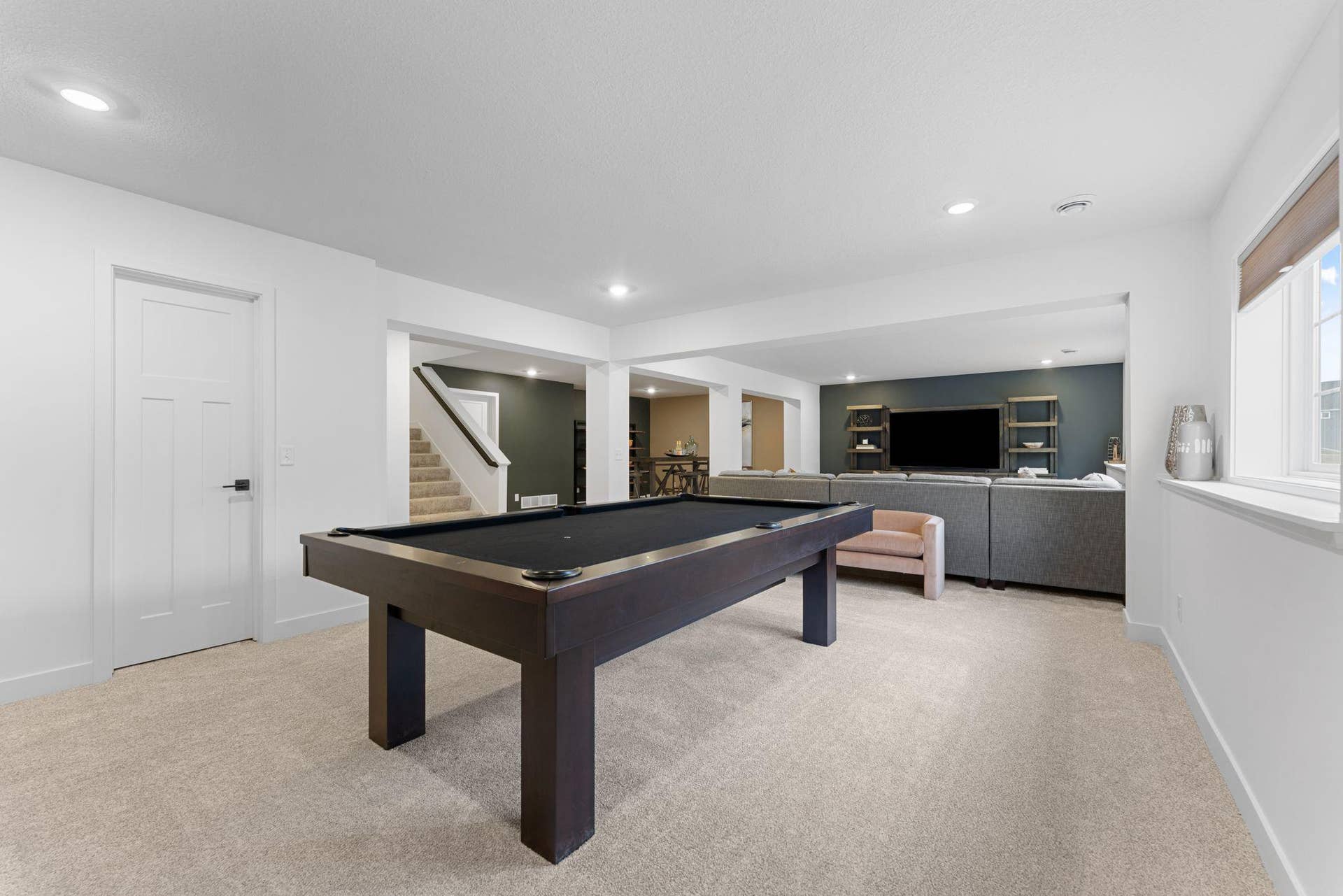 1848 Royal Boulevard N, Lake Elmo, MN 55042 The finished basement offers a game room, perfect for hosting and entertaining guests!