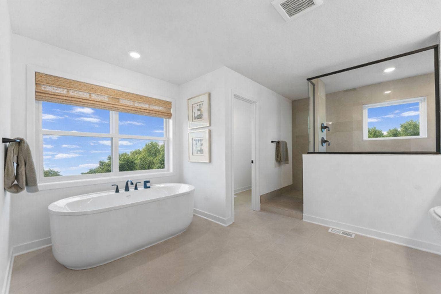 1848 Royal Boulevard N, Lake Elmo, MN 55042 The oversized open-air shower with ceramic tile surround offers a luxurious approach to morning routines