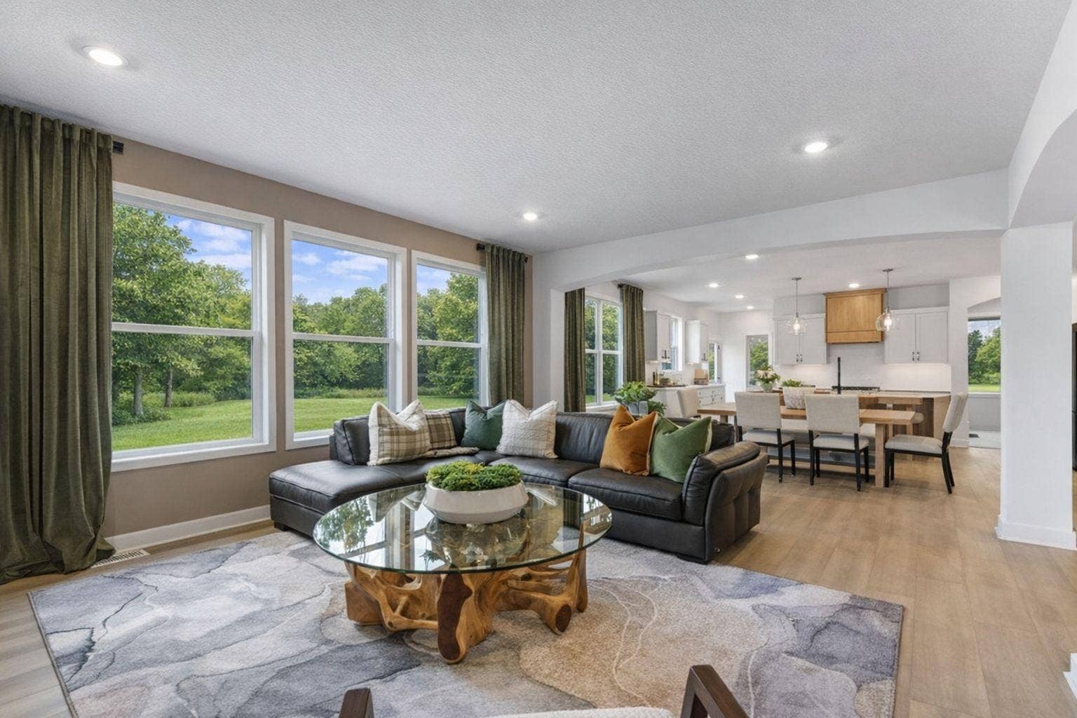 1848 Royal Boulevard N, Lake Elmo, MN 55042 As the heart of this home, the spacious Great Room offers an ideal space for relaxing with loved ones and creating cherished memories, with a charming center fireplace to add a special warmth.