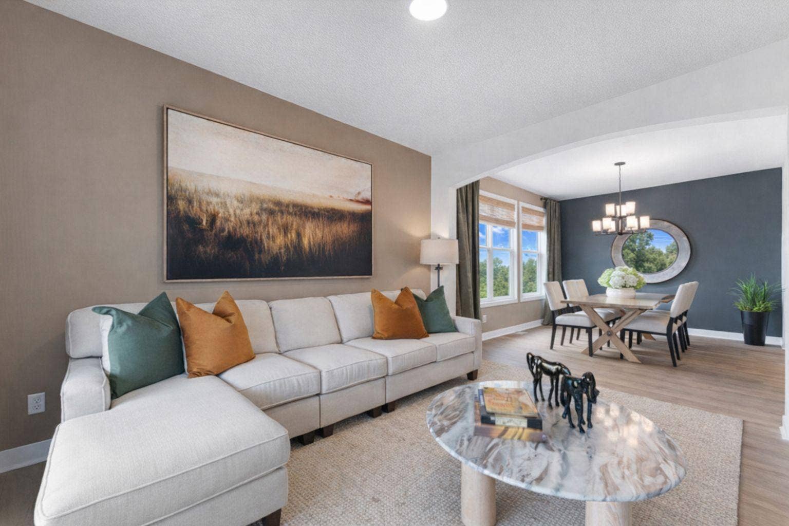 1848 Royal Boulevard N, Lake Elmo, MN 55042 Situated directly off the foyer, this living room can act as a quiet reading area or an elegant sitting room to host newly arrived guests.