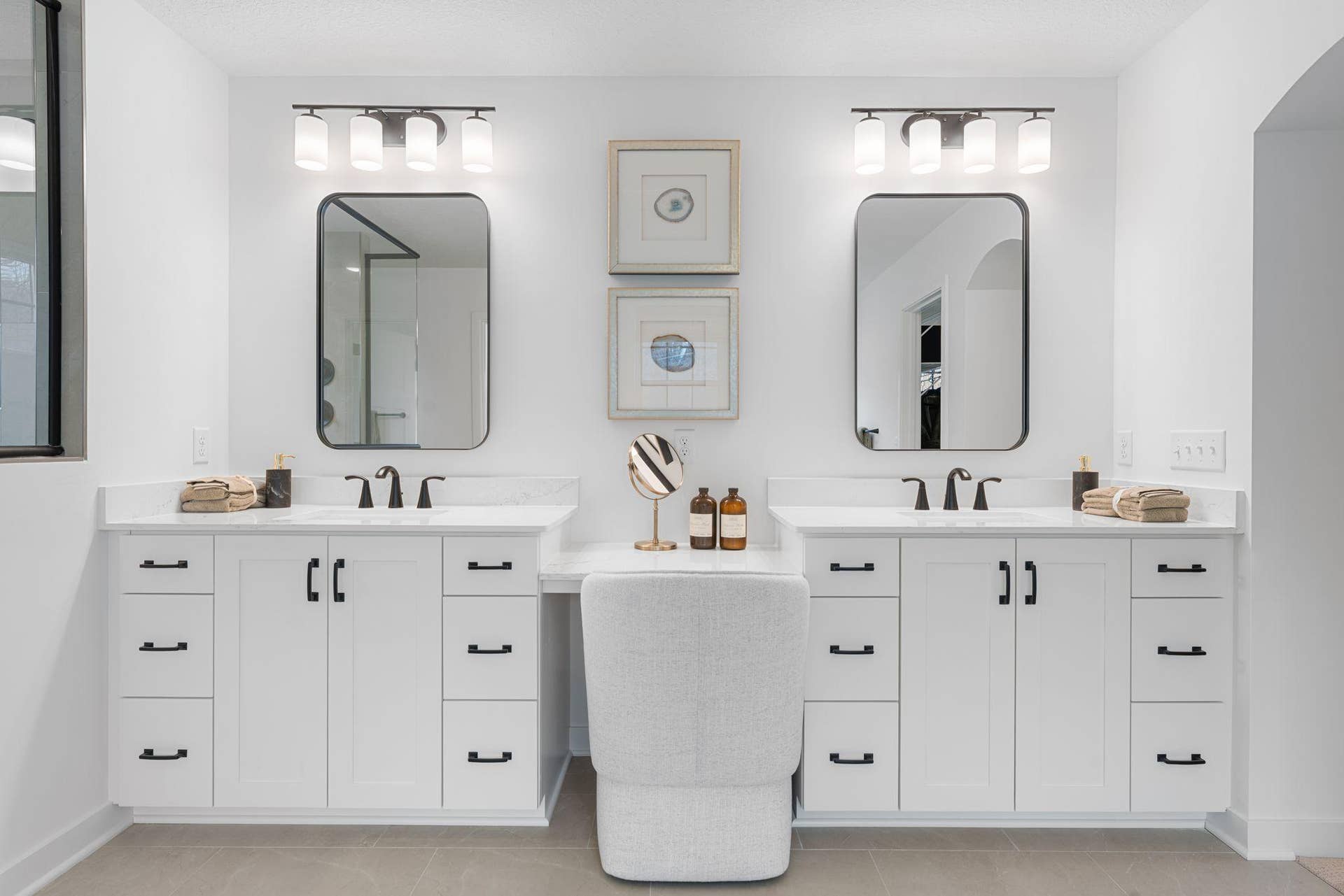 1848 Royal Boulevard N, Lake Elmo, MN 55042 Split vanities and individual mirrors allow homeowners ample personal space to greet the day