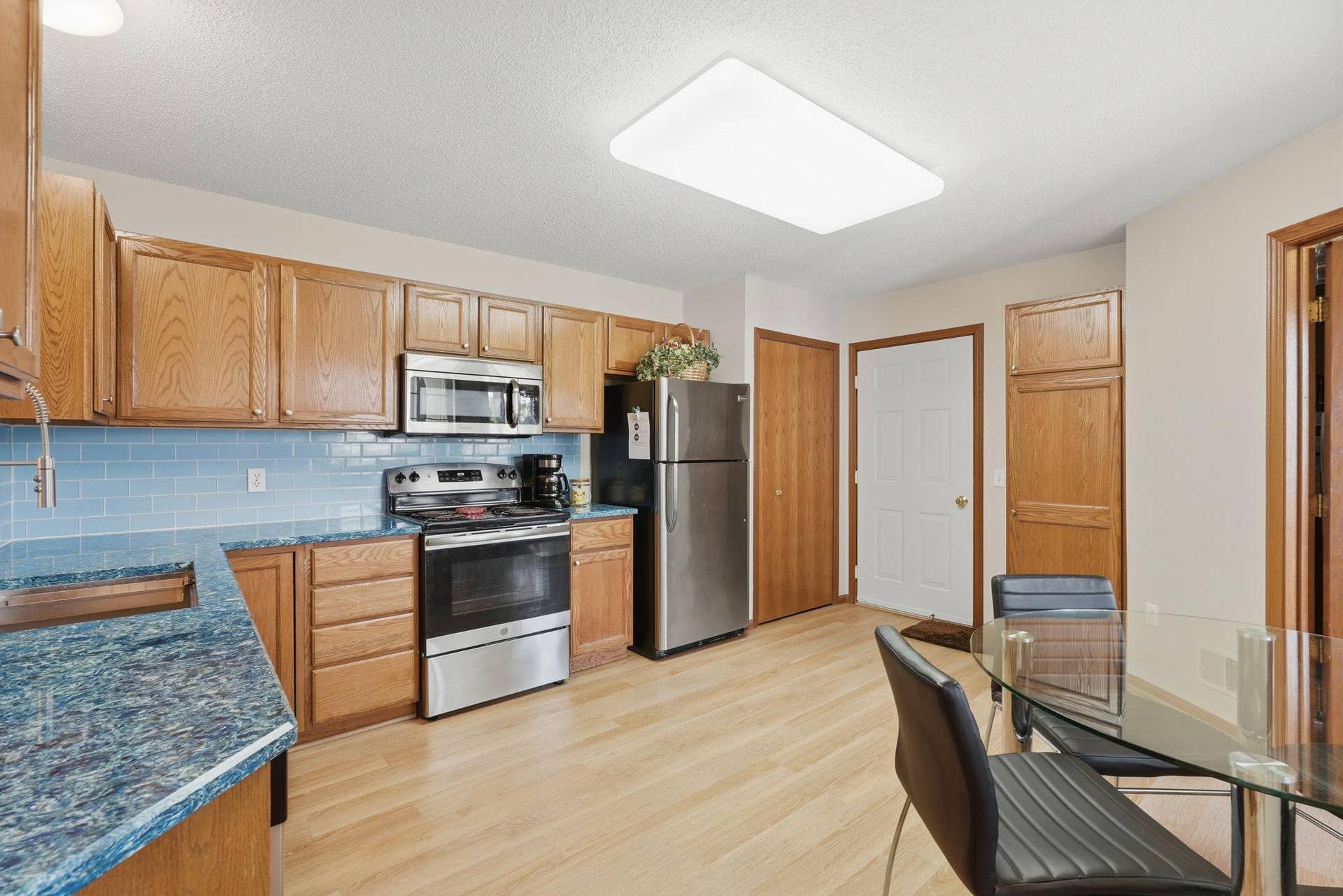 762 Lake Ridge Drive, Woodbury, MN 55129 Kitchen features luxury vinyl tile flooring