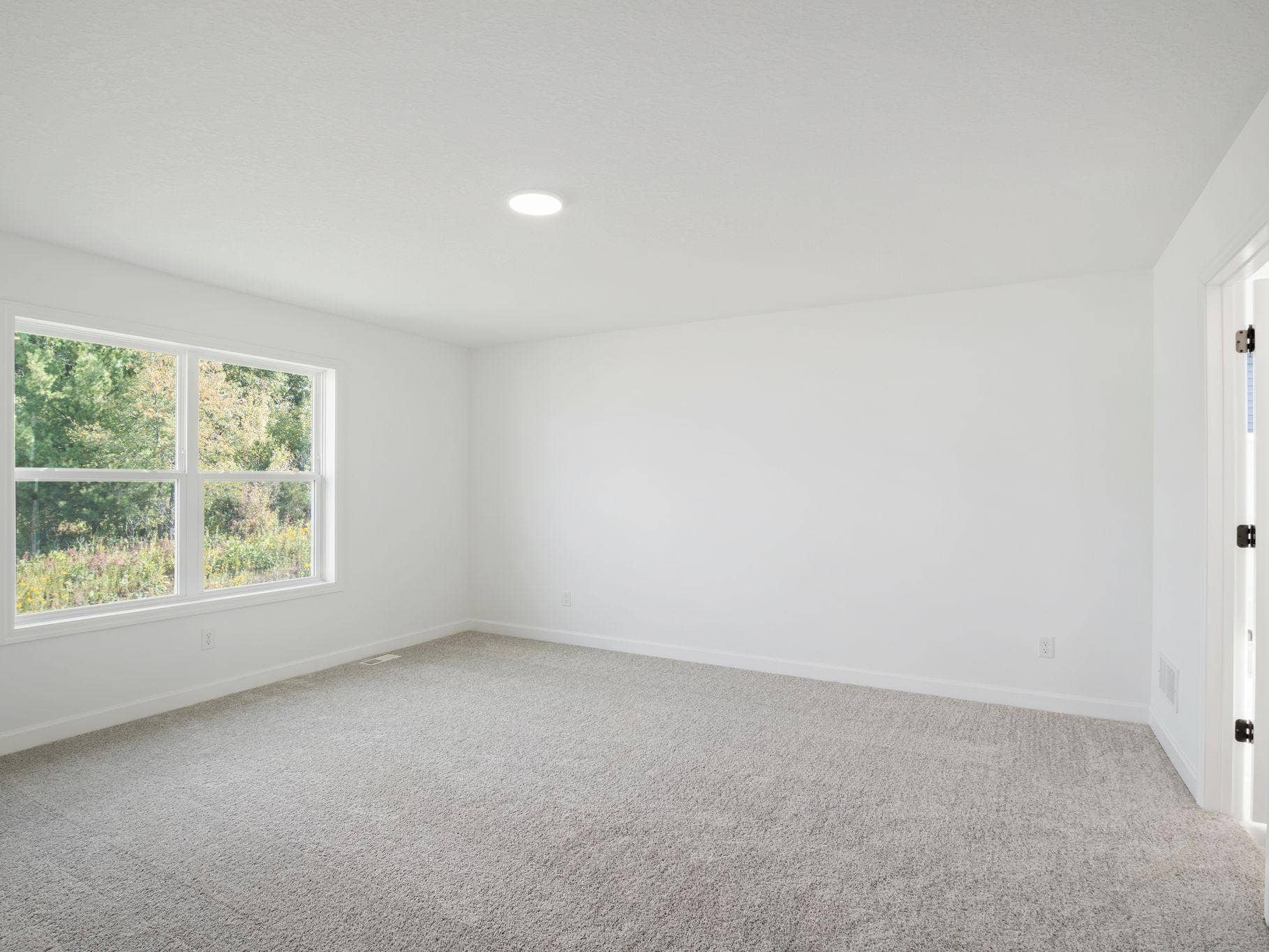 8656 Periwinkle Boulevard, Woodbury, MN 55129 Providing the upmost in privacy, the luxurious owners suite is located on the second level and has a walk-in closet and en-suite bathroom.