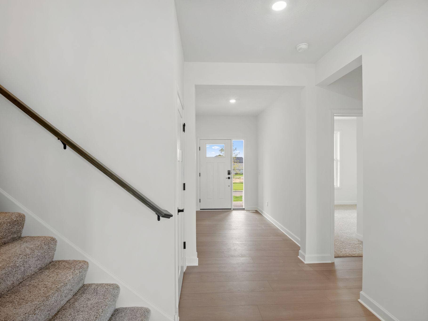 8656 Periwinkle Boulevard, Woodbury, MN 55129 The open-concept design creates a feeling of space while improving the flow of the home