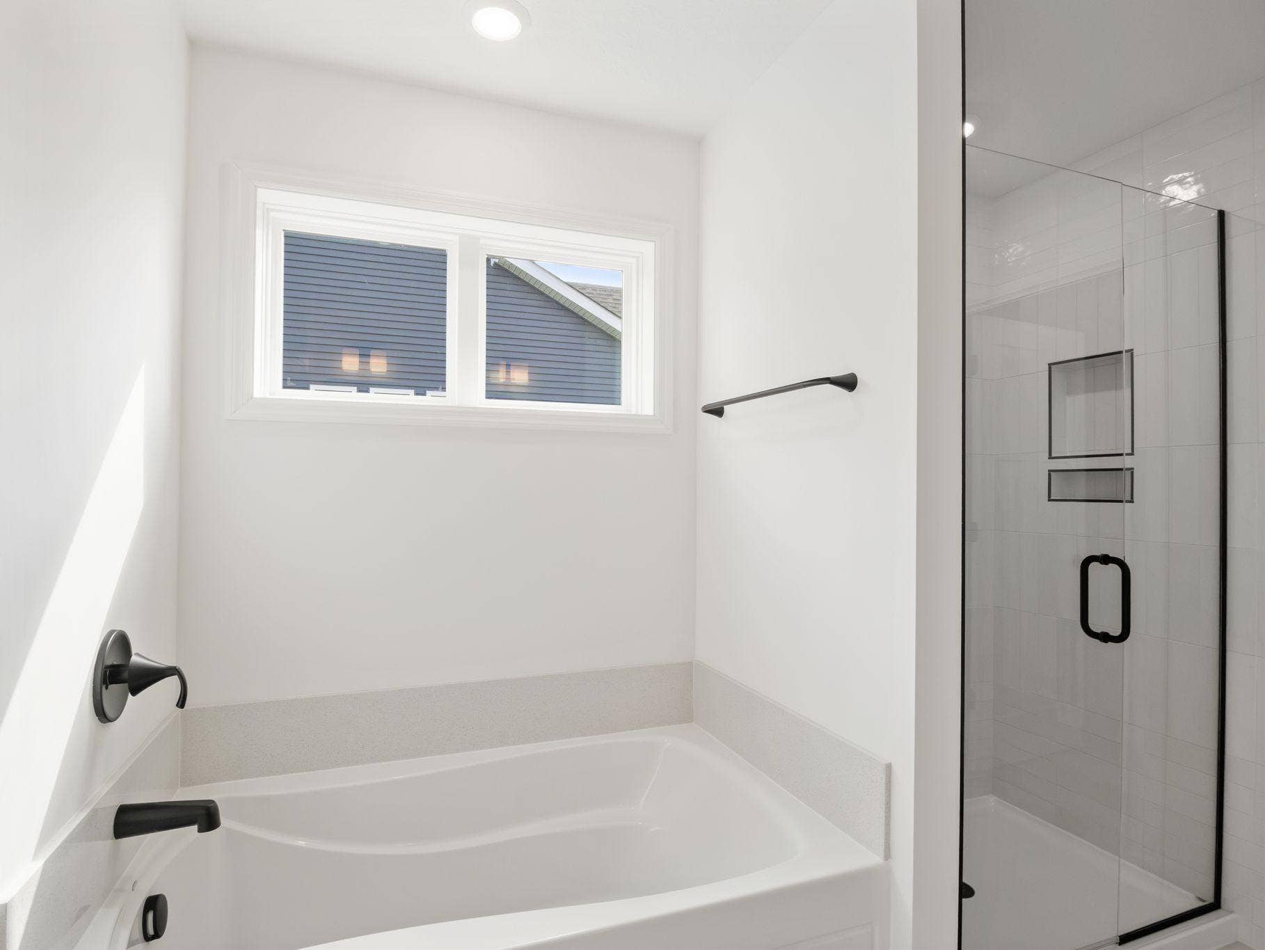 8656 Periwinkle Boulevard, Woodbury, MN 55129 All bathrooms are equipped with high-grade finishes