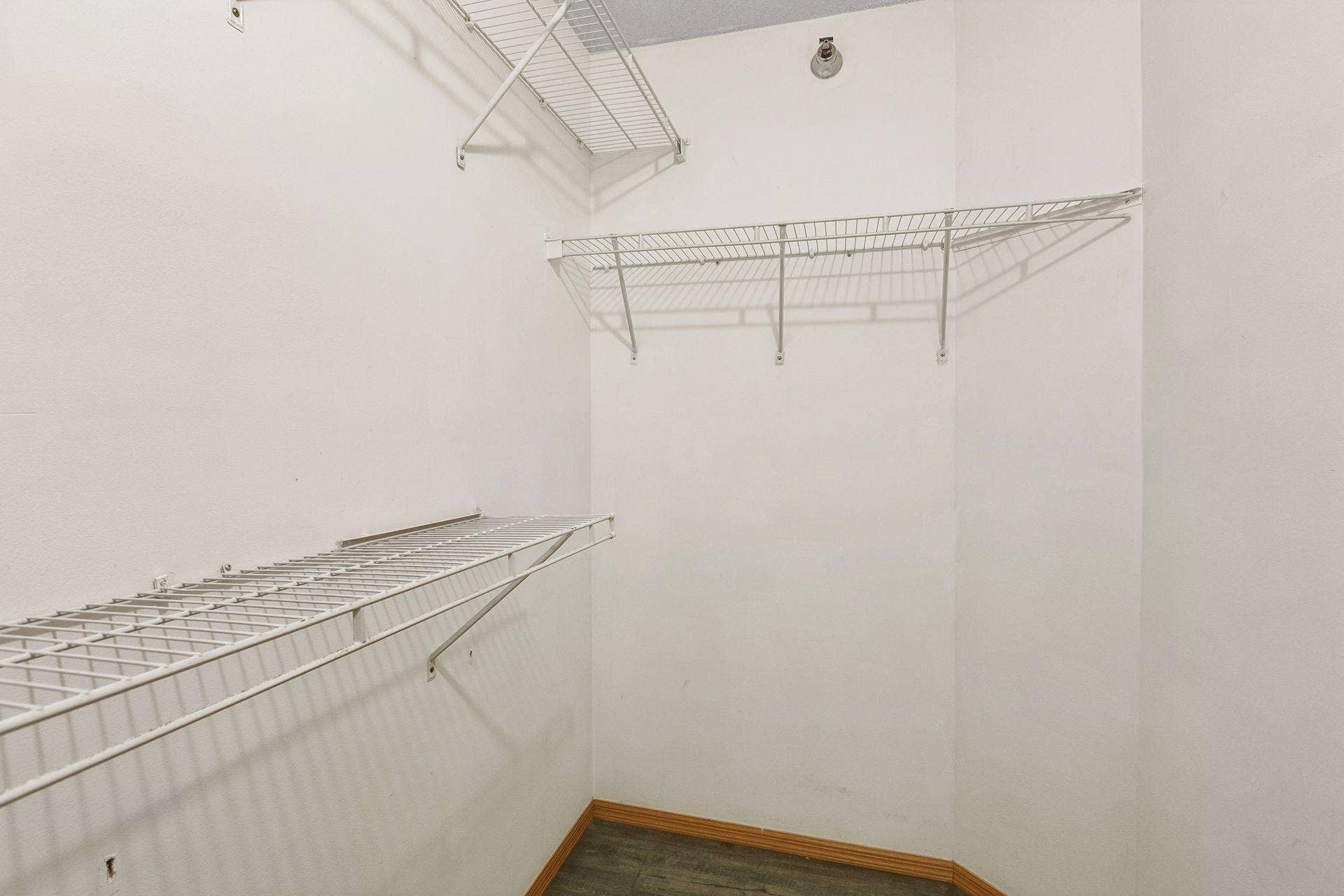 Primary walk-in closet.