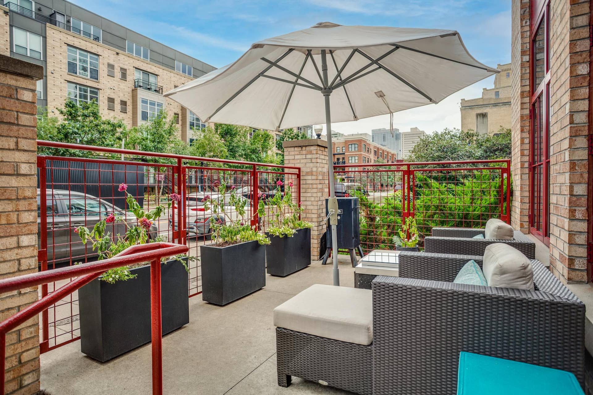 600 S 2nd Street, #S108, 18, Minneapolis, MN 55401 The living room has direct access to the private gated patio, wonderful for indoor-outdoor living in the heart of the city.
