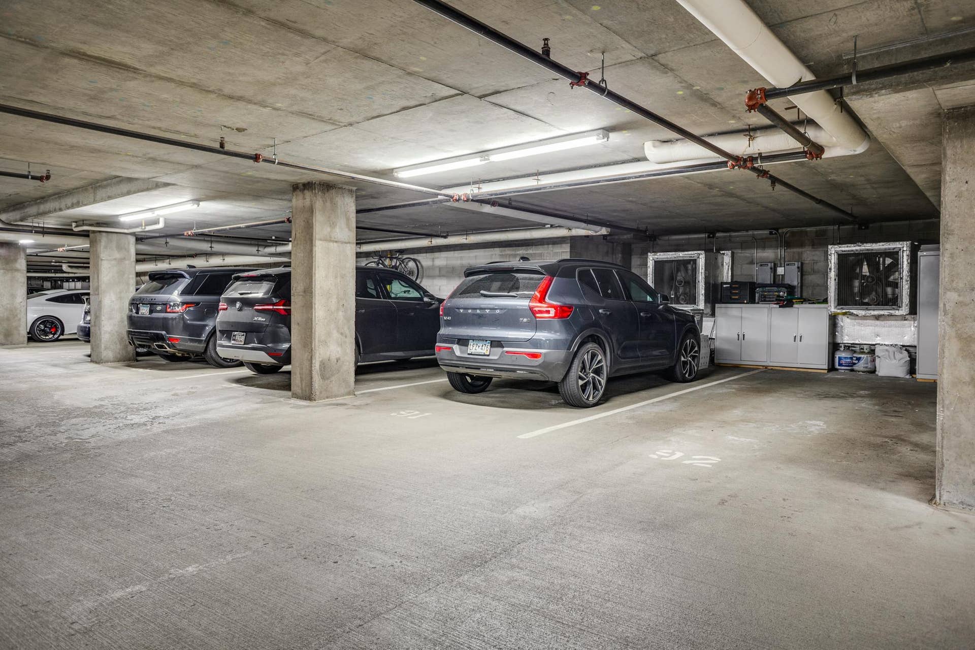 600 S 2nd Street, #S108, 18, Minneapolis, MN 55401 Two underground heated parking spaces with storage cabinets near the elevator are included.