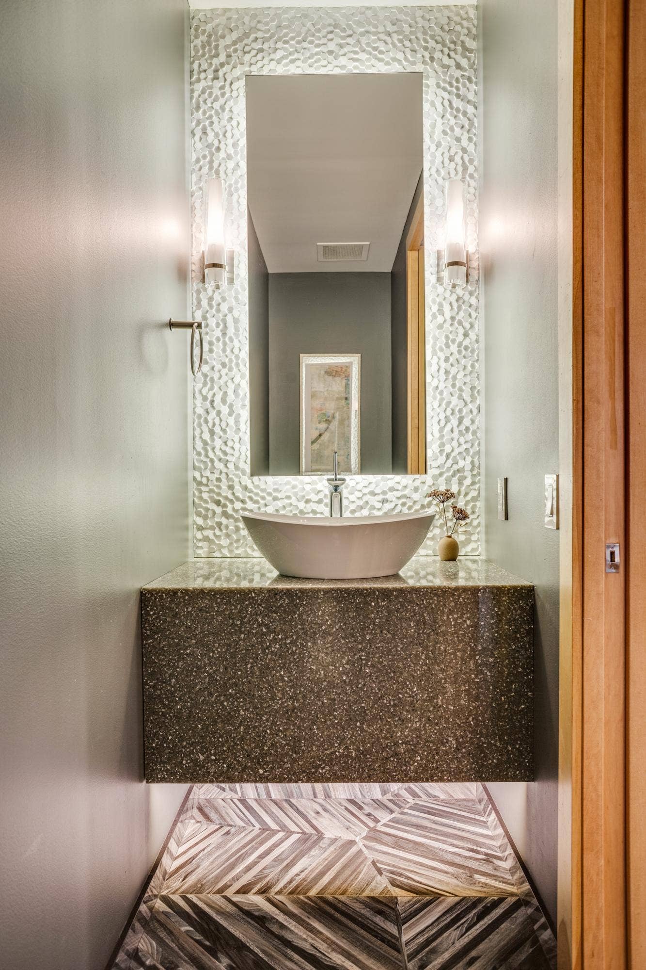 600 S 2nd Street, #S108, 18, Minneapolis, MN 55401 The main level half-bathroom is well-positioned in the unit and features stunning finishes.