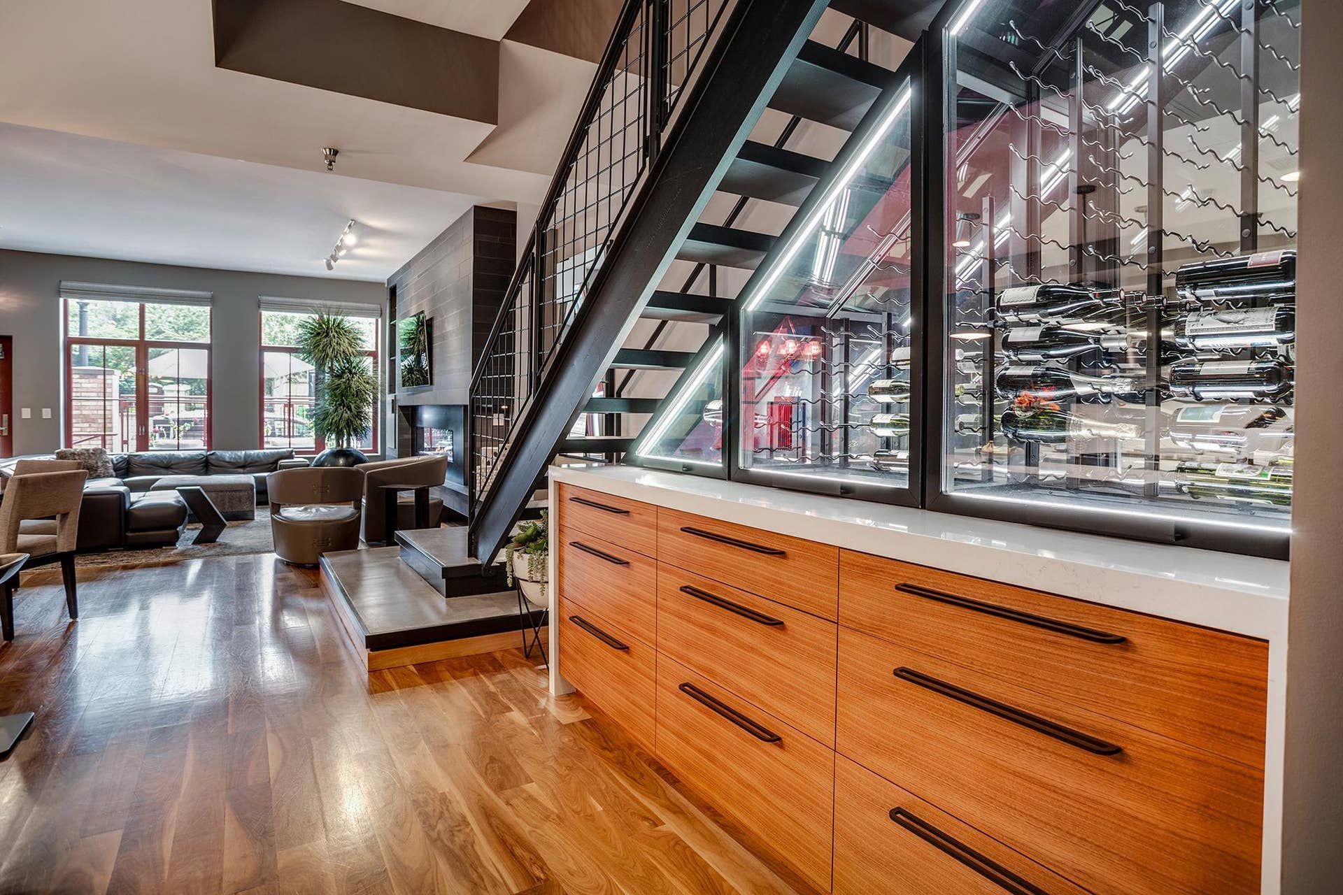 600 S 2nd Street, #S108, 18, Minneapolis, MN 55401 The wine cellar acts as functional art with temperature controls and dramatic lighting.